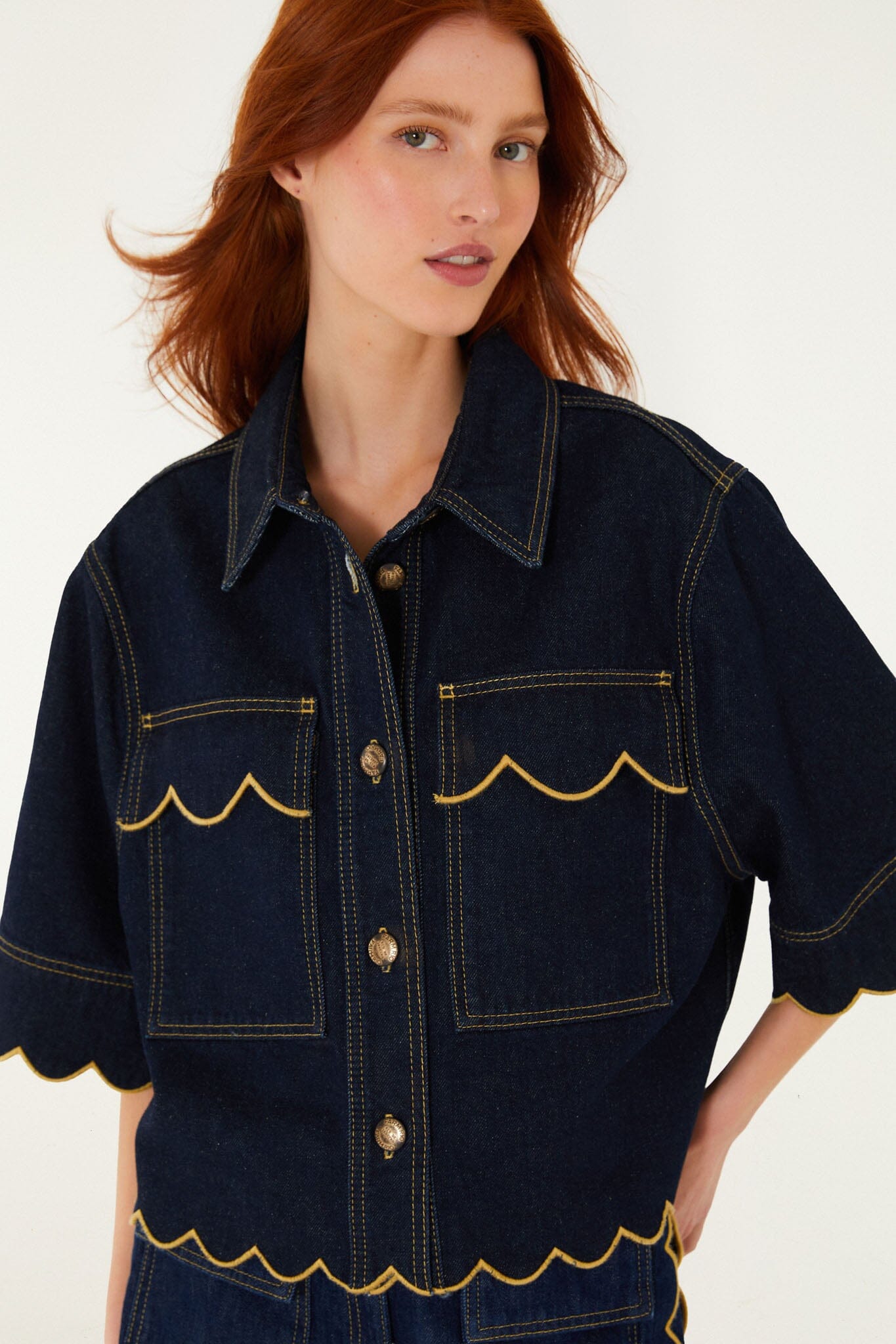 FARM Rio model wearing the Dark Denim Wavy Hem Short Sleeve Shirt
