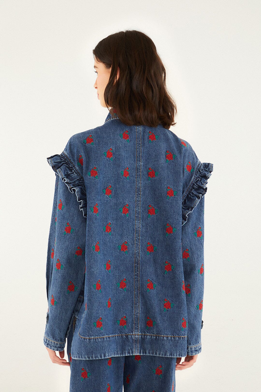 FARM Rio model wearing the Denim Embroidered Flowers Shirt