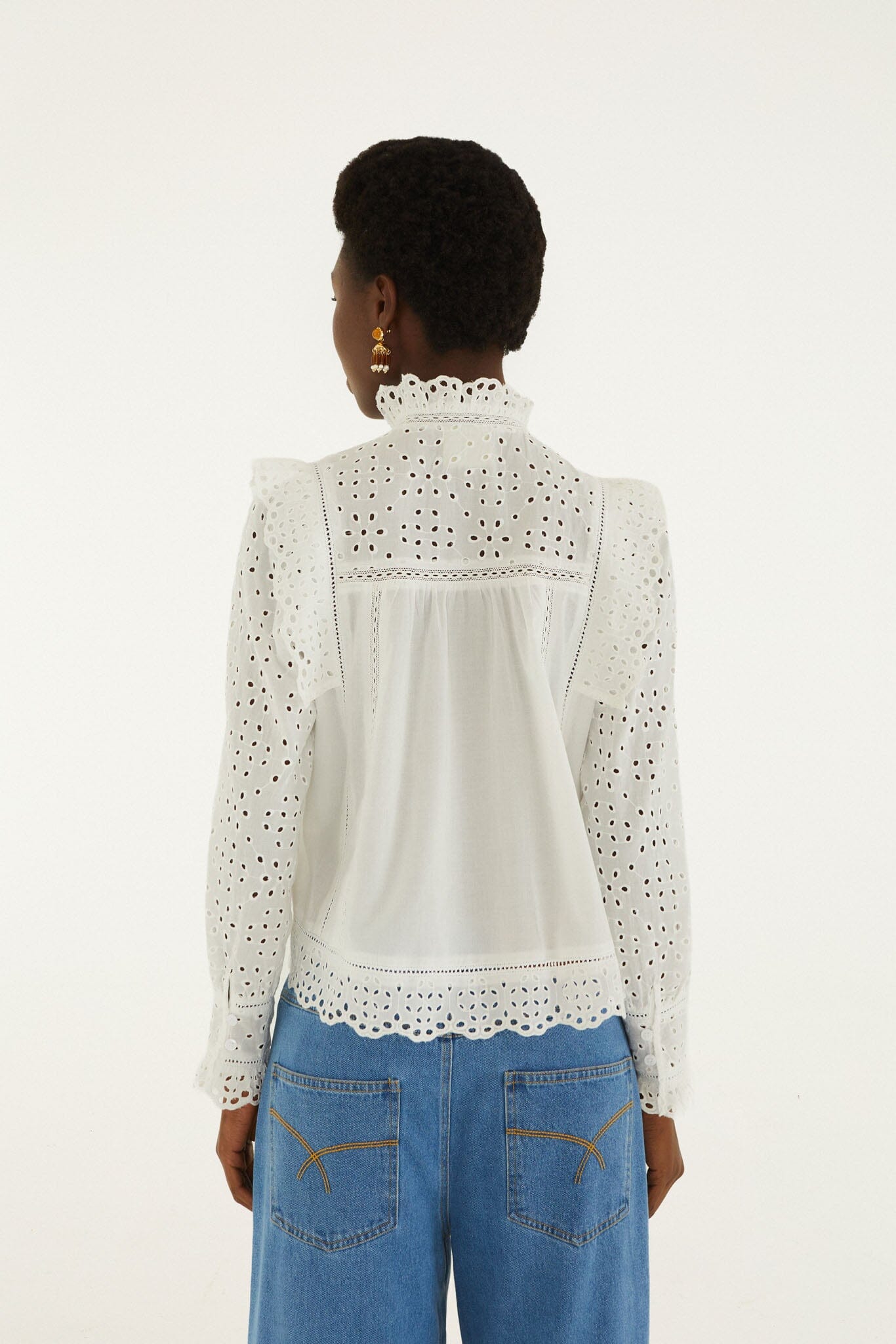 FARM Rio model wearing the Eyelet Long Sleeve Blouse