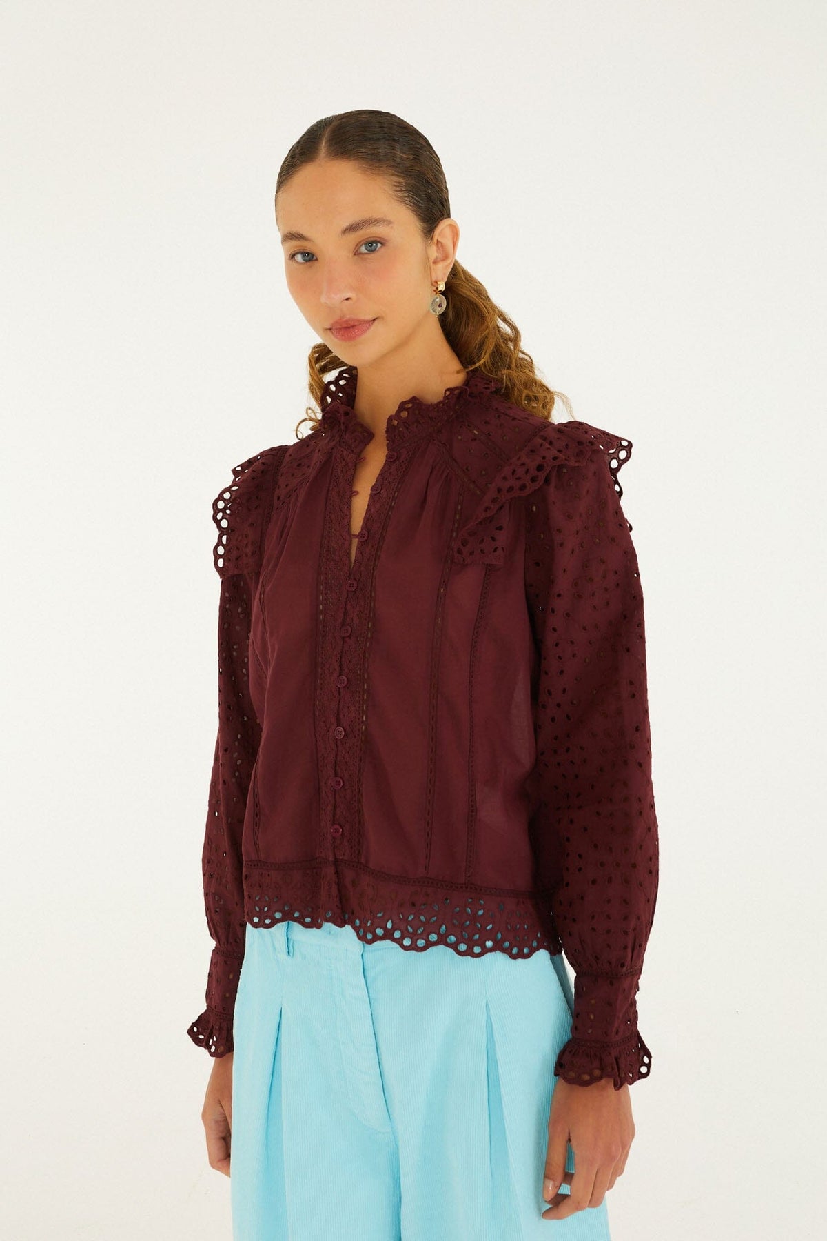 FARM Rio model wearing the Eyelet Long Sleeve Ruffled Blouse