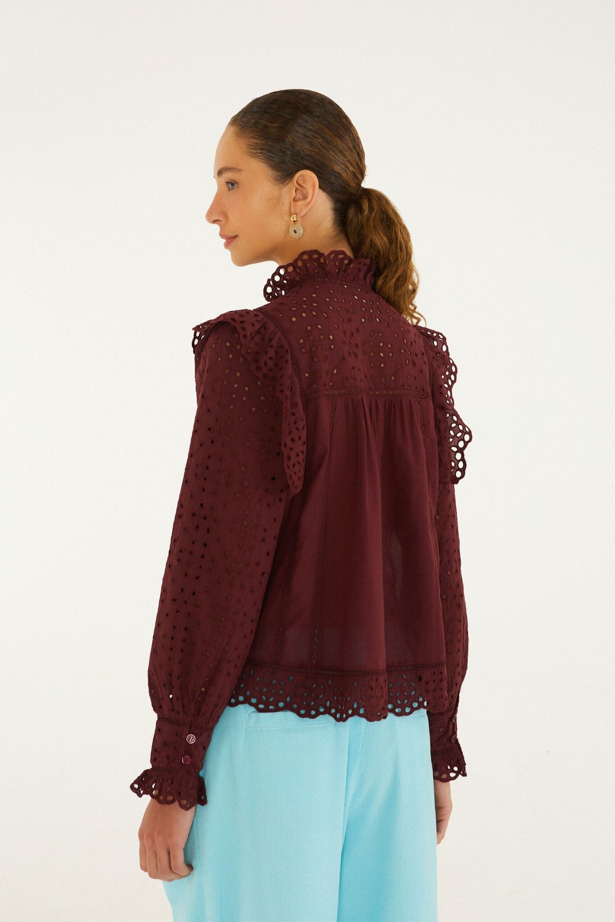 FARM Rio model wearing the Eyelet Long Sleeve Ruffled Blouse