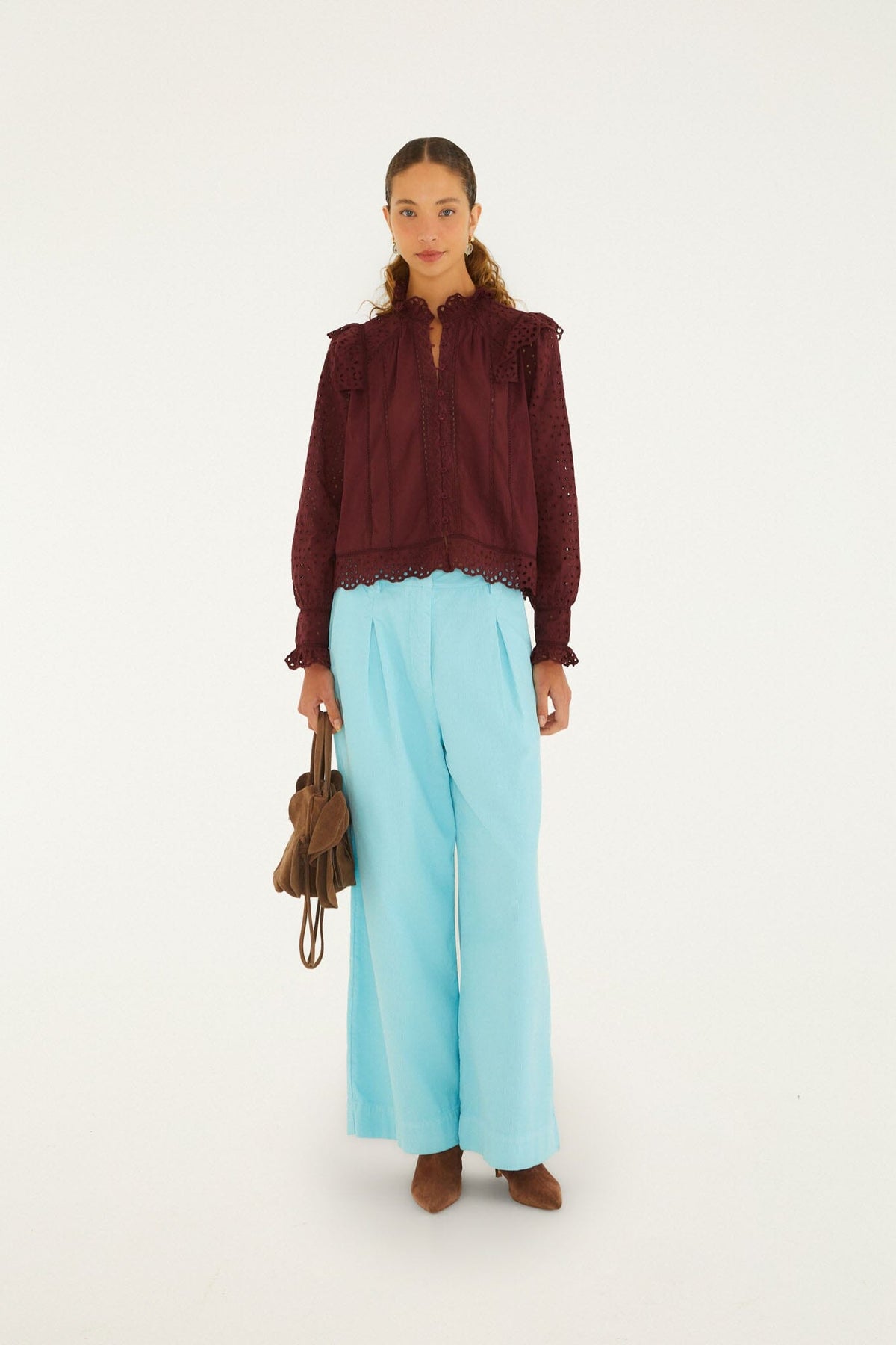 FARM Rio model wearing the Eyelet Long Sleeve Ruffled Blouse