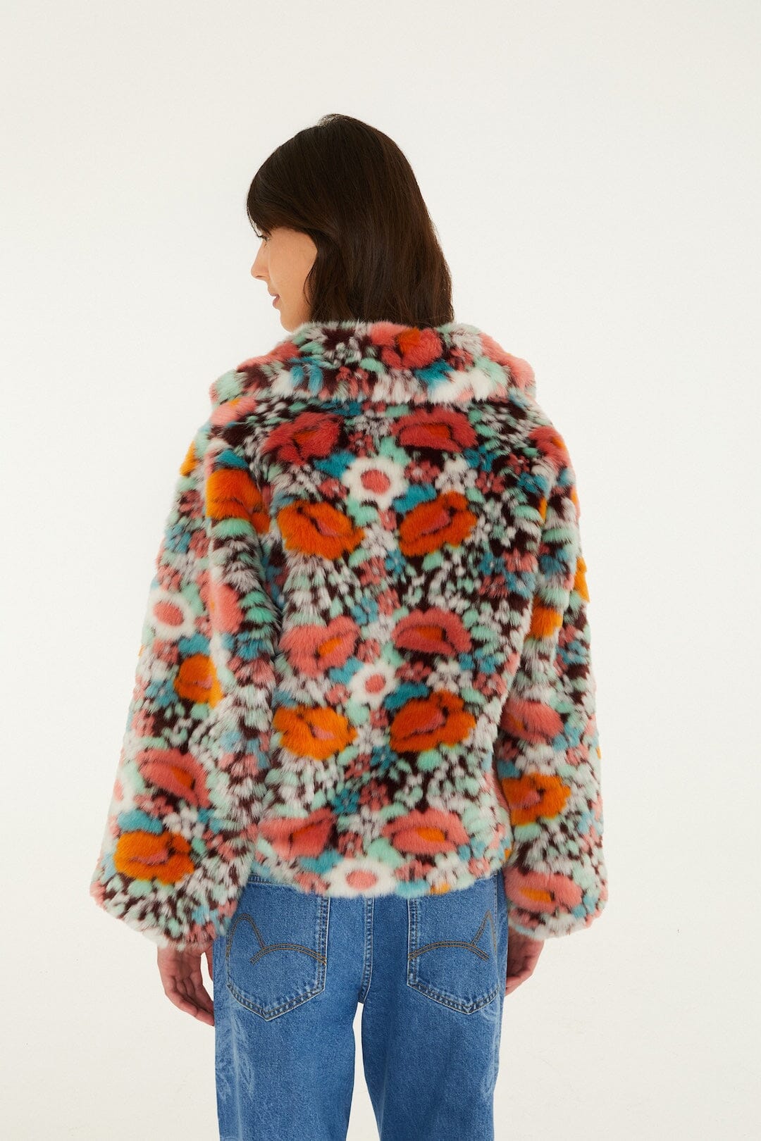 FARM Rio model wearing the Floral Faux Fur Crop Jacket