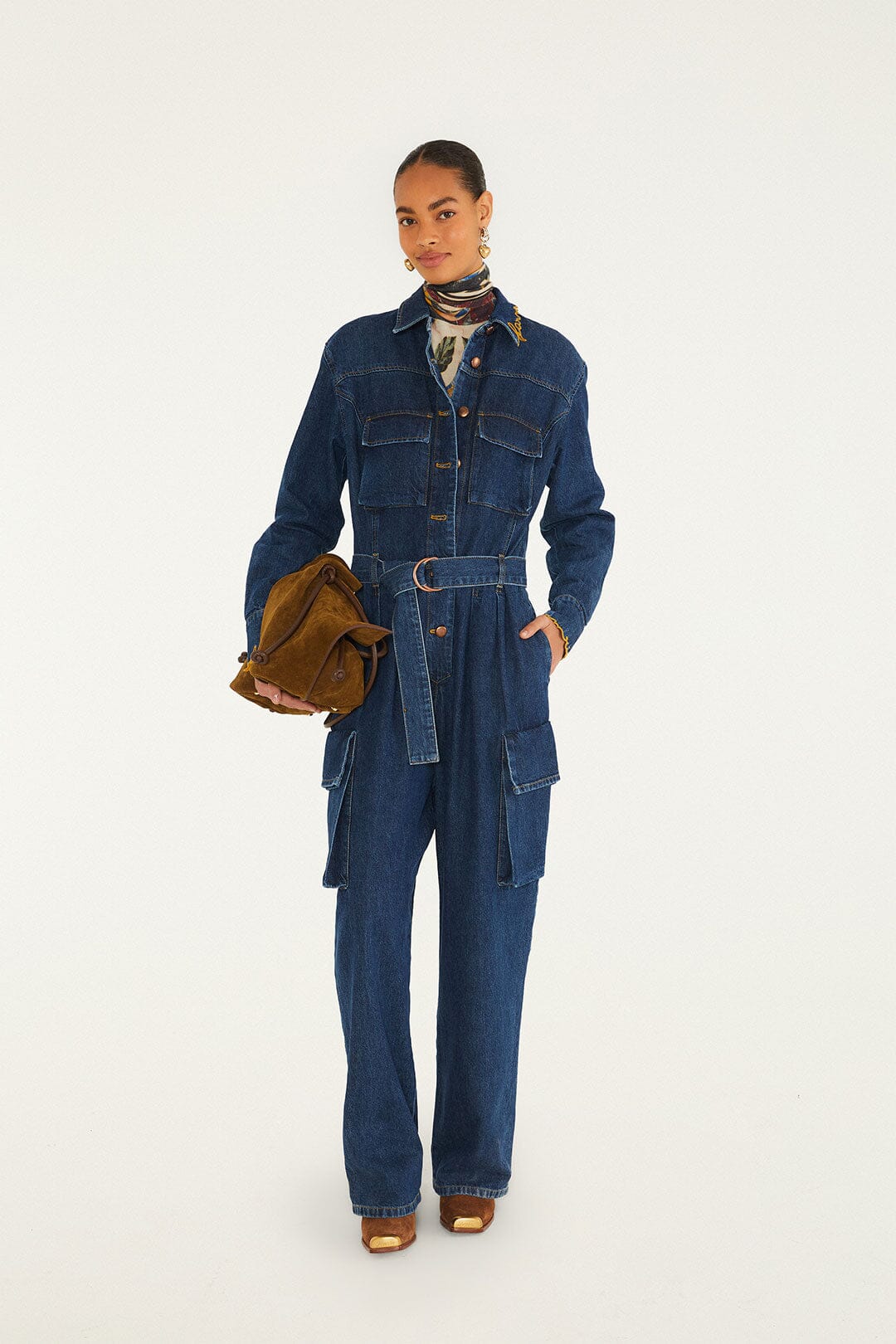 FARM Rio model wearing the Flores De Mármore Denim Jumpsuit