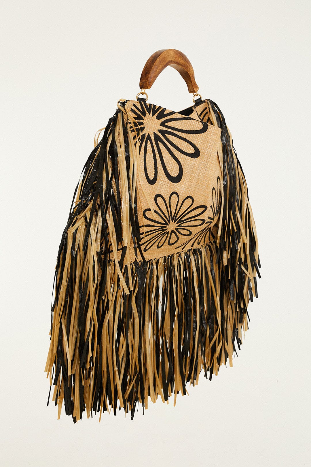 FARM Rio model wearing the Fringed Raffia Mini Bag