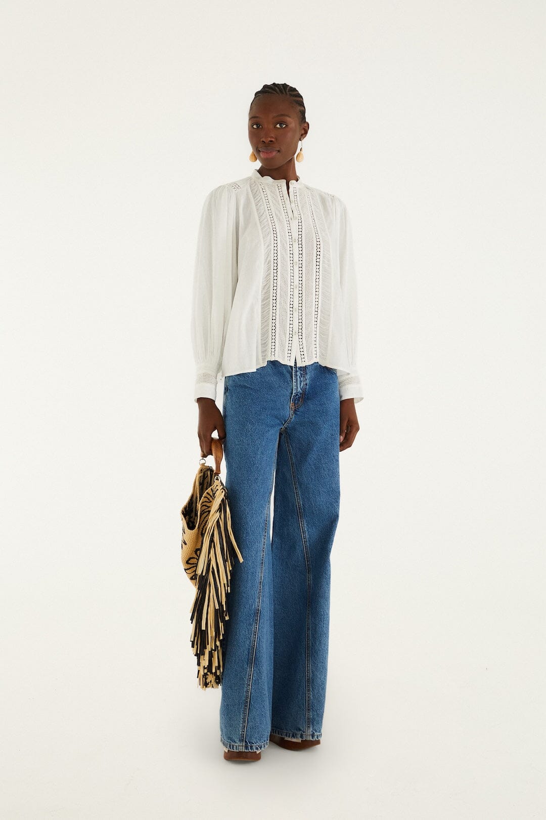 FARM Rio model wearing the Fringed Raffia Mini Bag