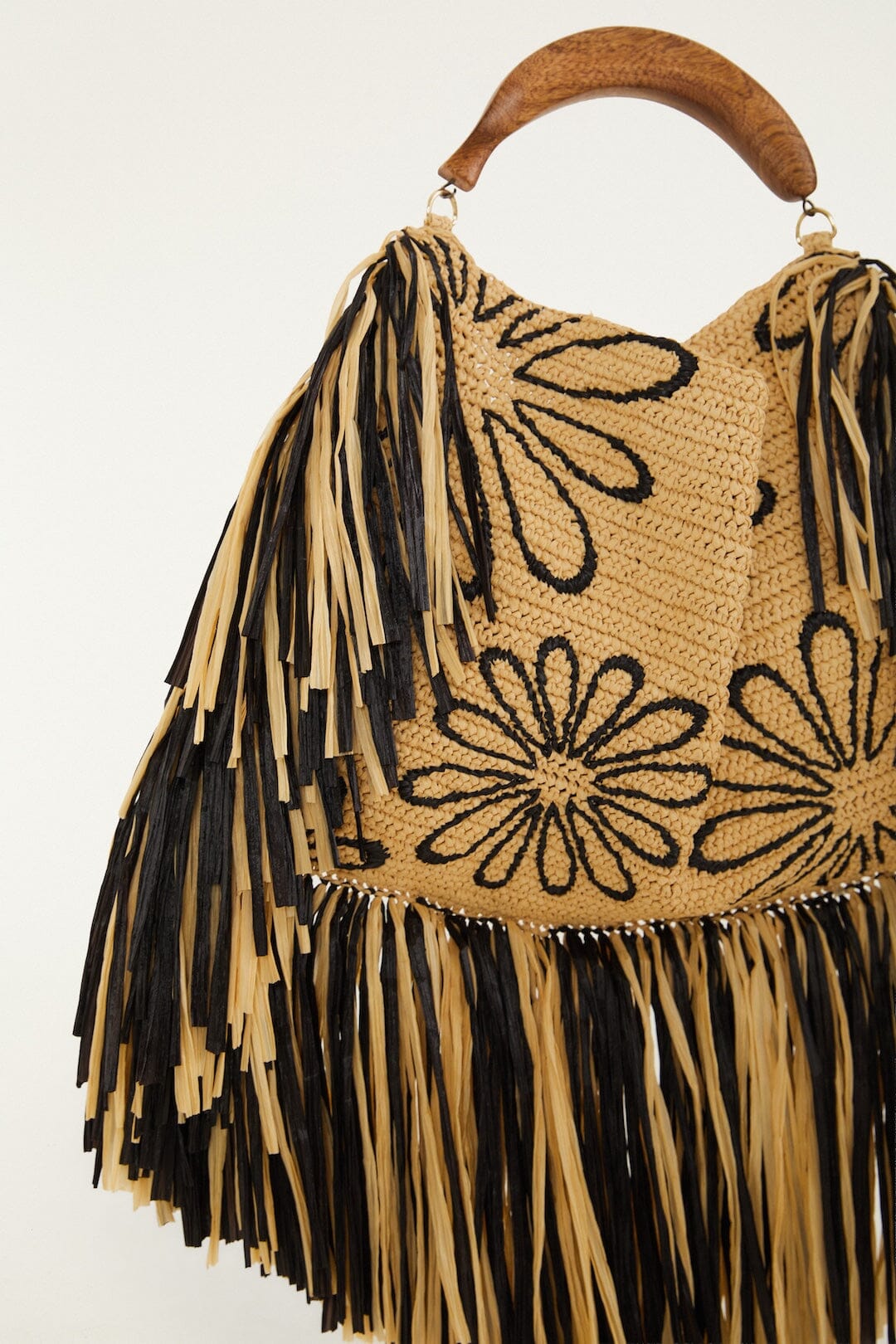 FARM Rio model wearing the Fringed Raffia Mini Bag