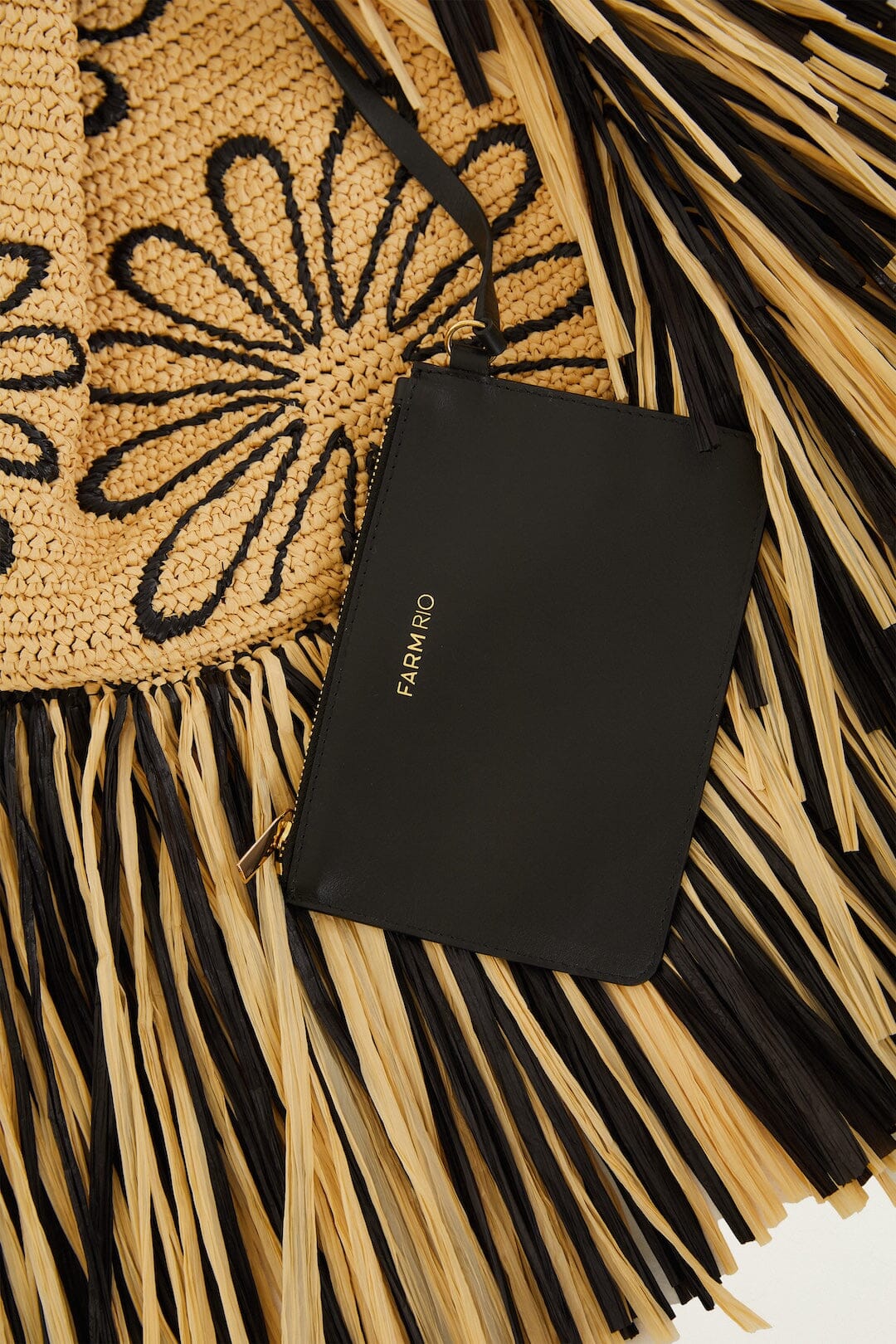FARM Rio model wearing the Fringed Raffia Mini Bag