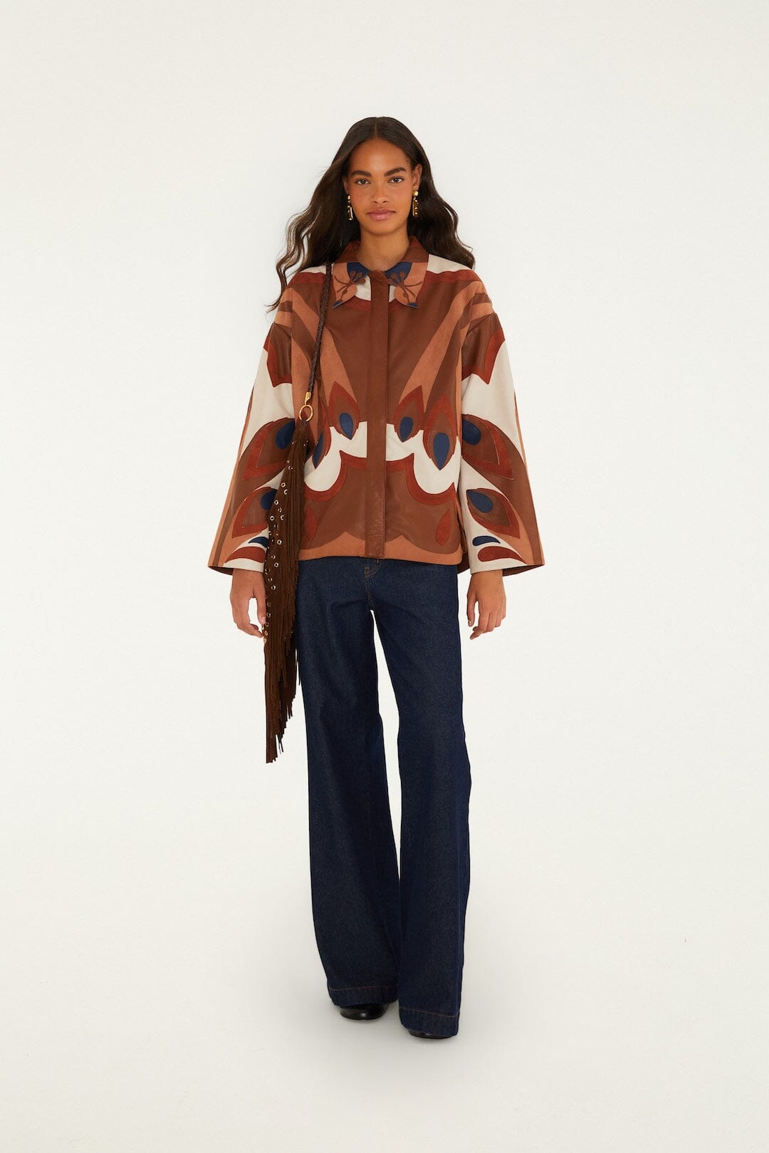 FARM Rio model wearing the Graphic Bird Collared Leather Shirt