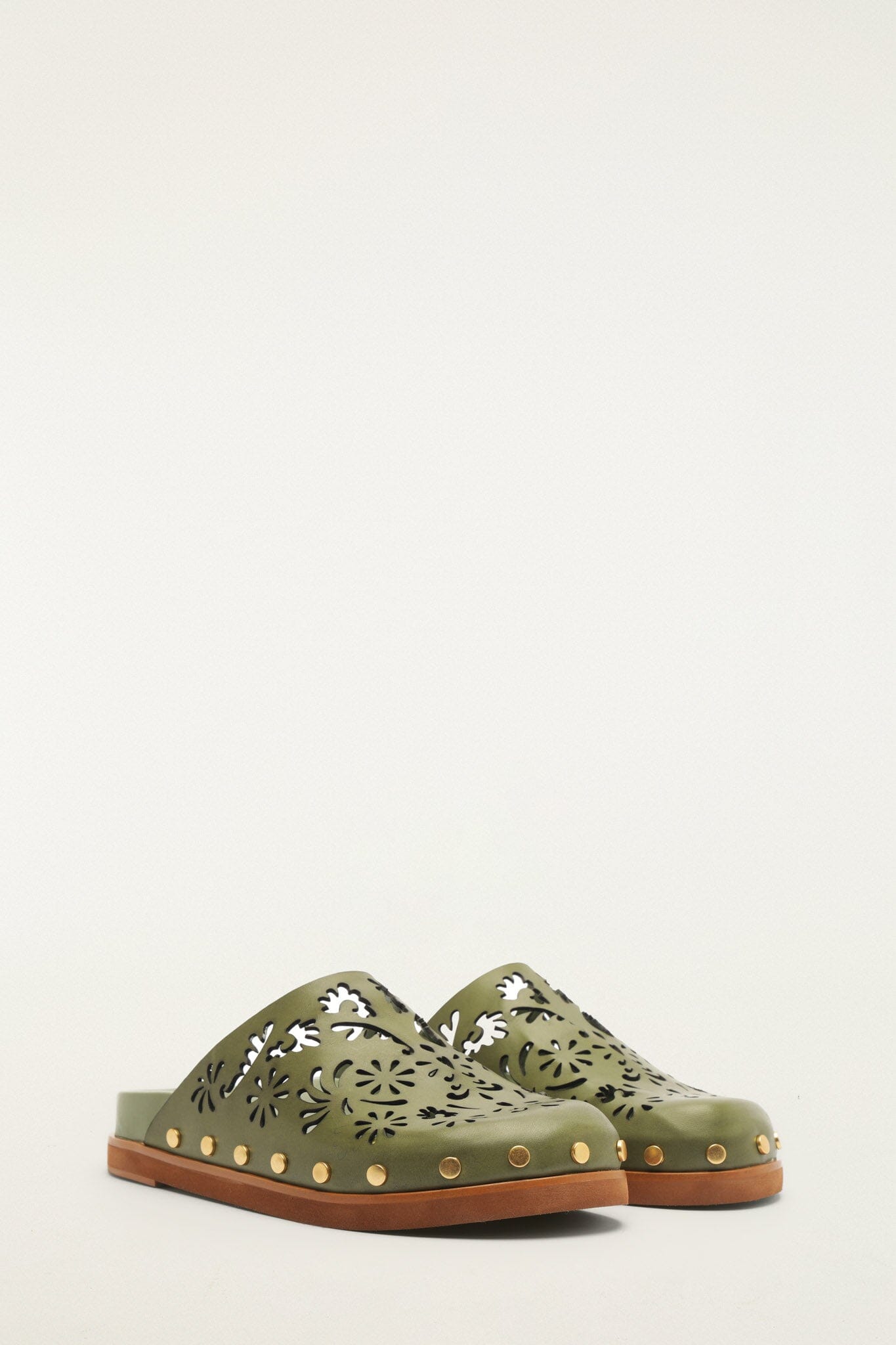 FARM Rio model wearing the Green Lace Leather Anatomic Slide Mule