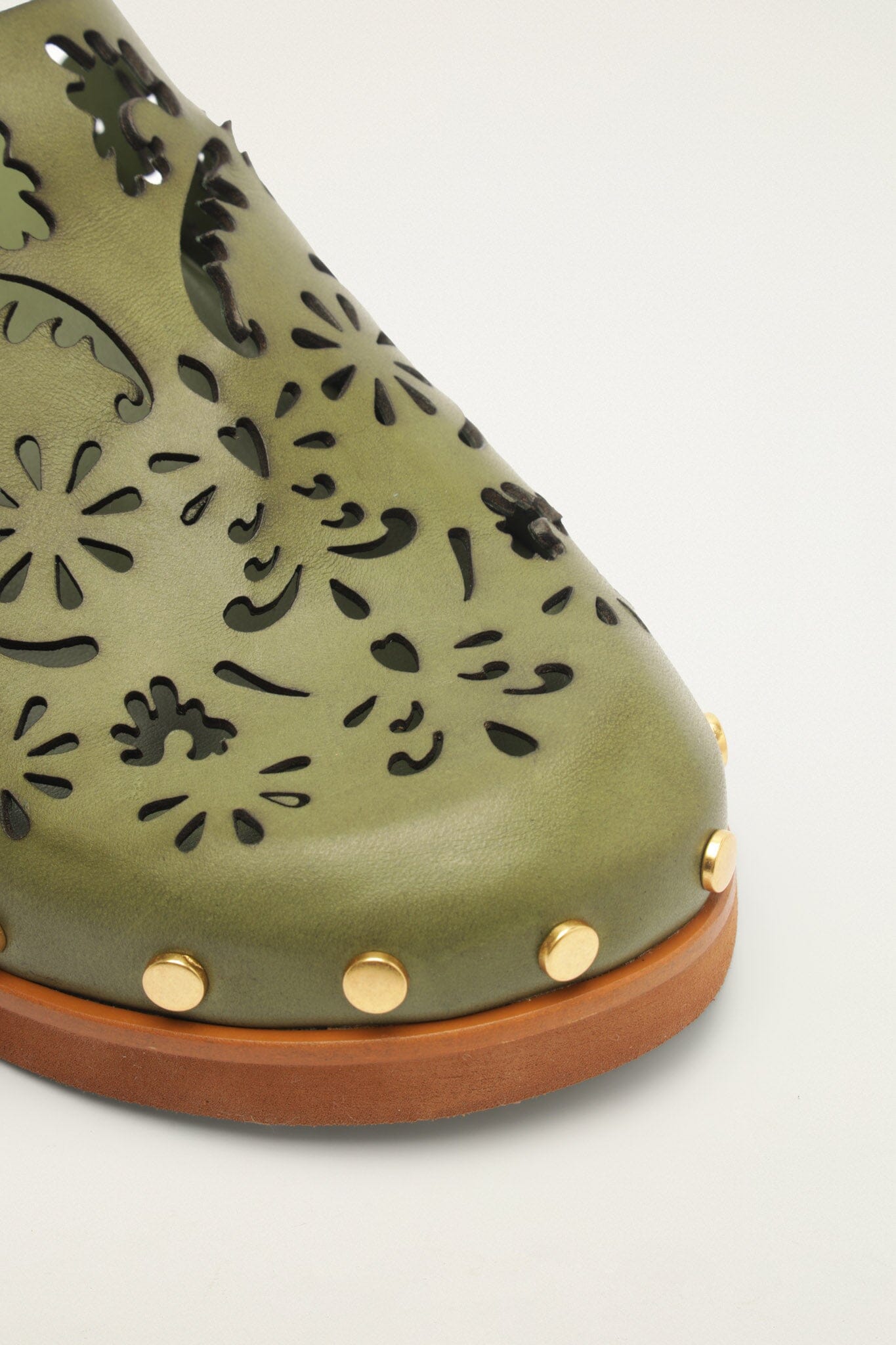 FARM Rio model wearing the Green Lace Leather Anatomic Slide Mule