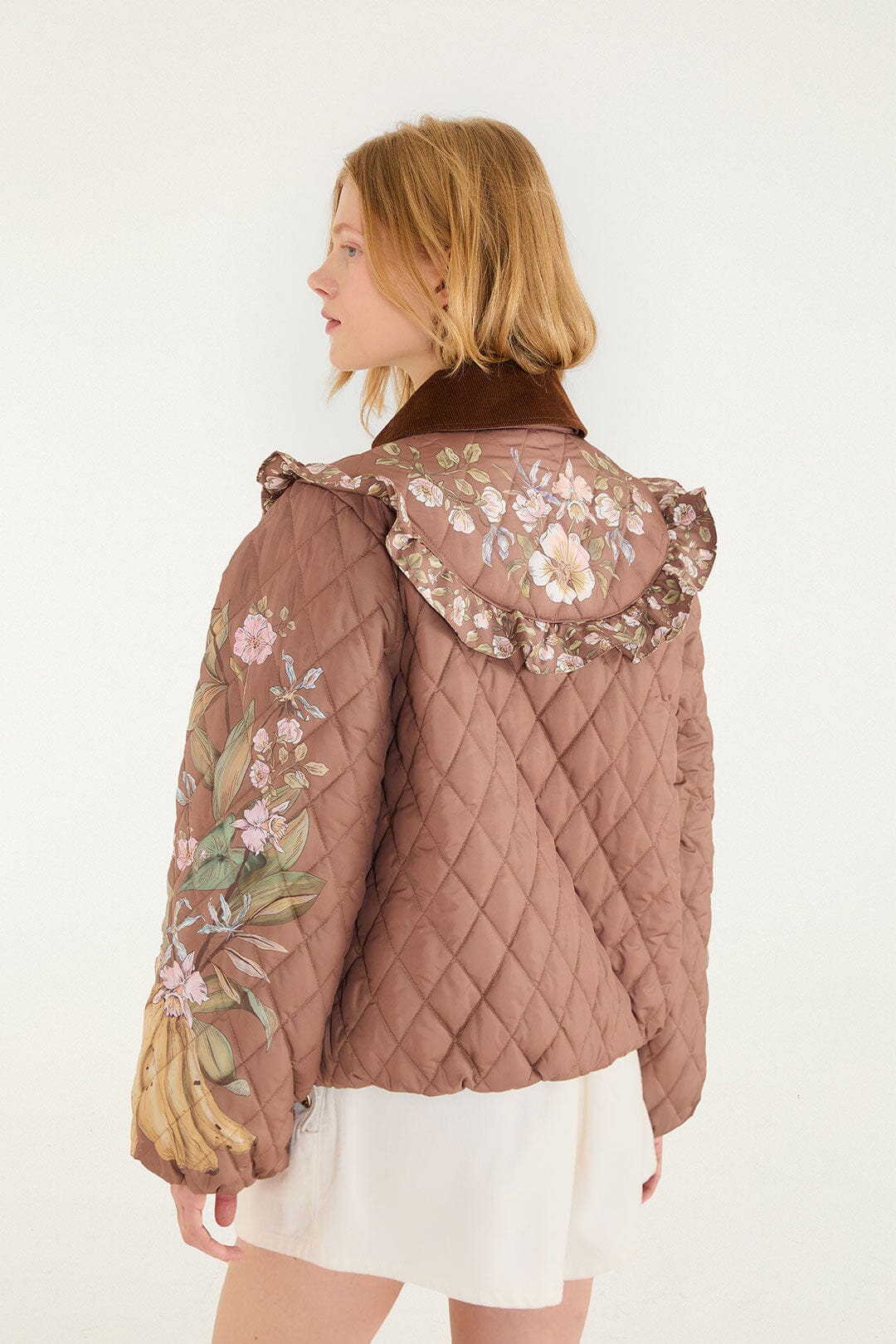 FARM Rio model wearing the Heart Of The Tropics Puff Sleeve Quilted Jacket