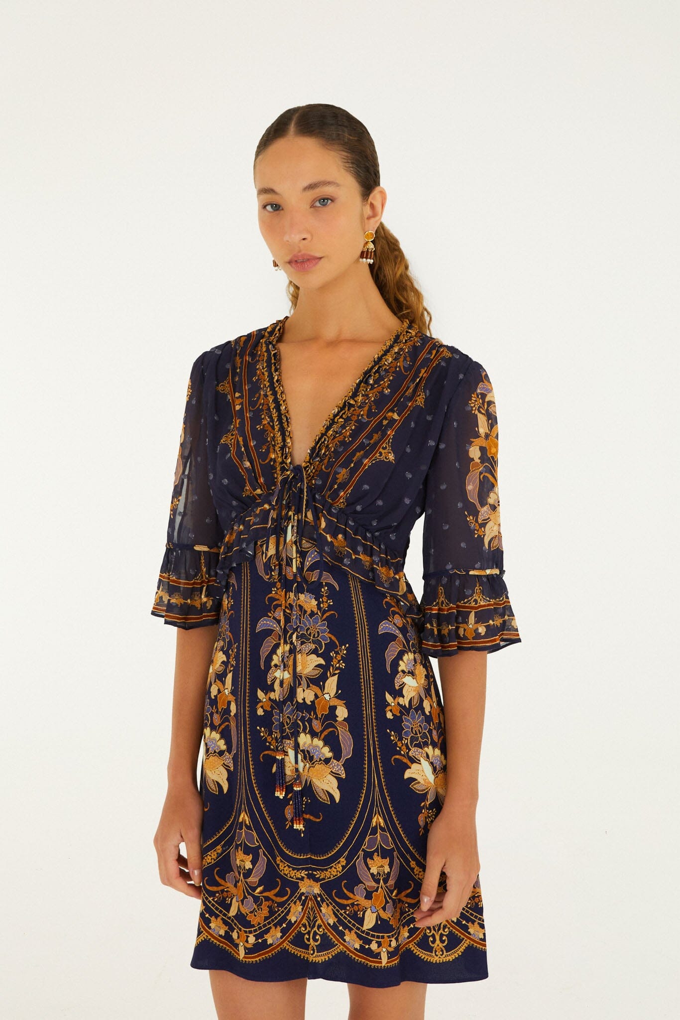 FARM Rio model wearing the Liz Ruffled Short Sleeve Mini Dress
