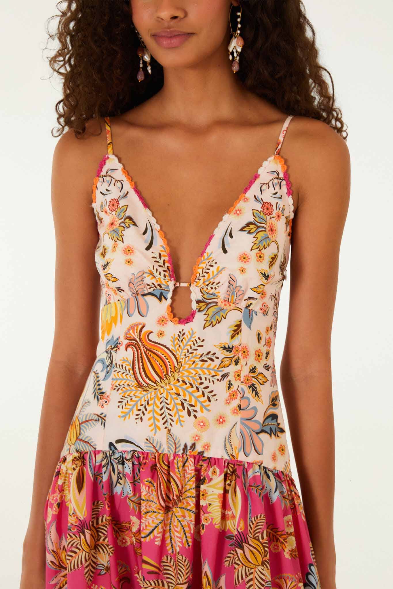 FARM Rio model wearing the Multicolor Ligia Floral Mix Organic Cotton Maxi Dress