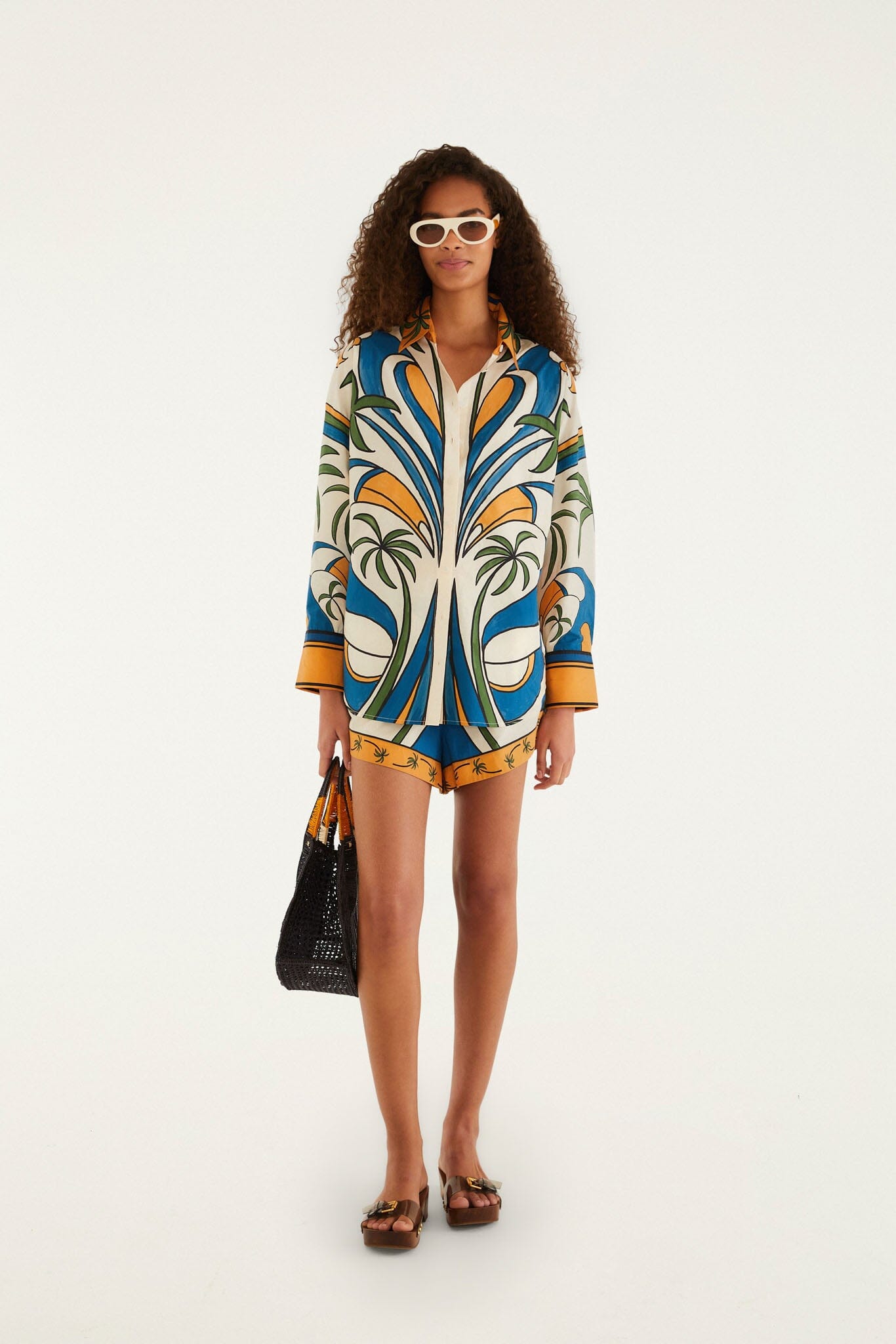 FARM Rio model wearing the Multicolor Tropical Graphic Collared Buttoned Shirt