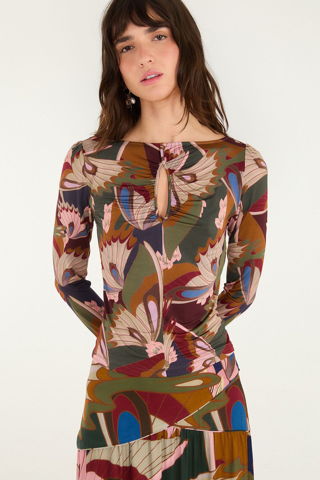 FARM Rio model wearing the Mystical Paradise Fit Long Sleeve Blouse