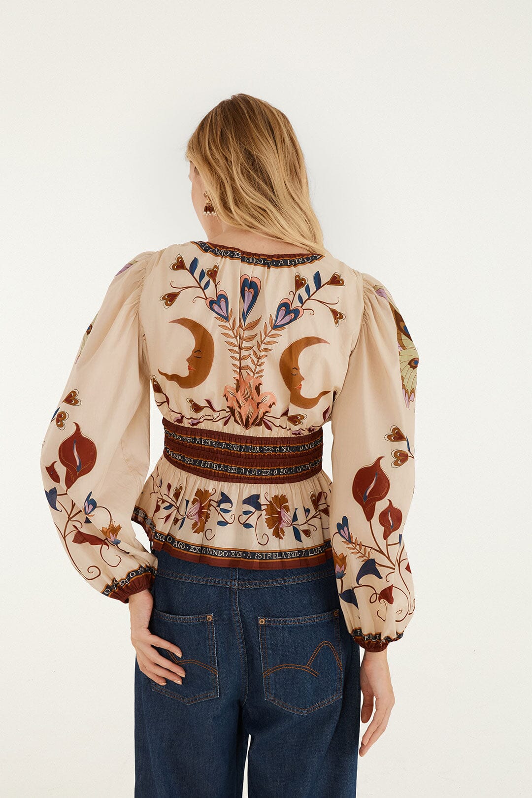 FARM Rio model wearing the Mystical Paradise Long Sleeve Blouse