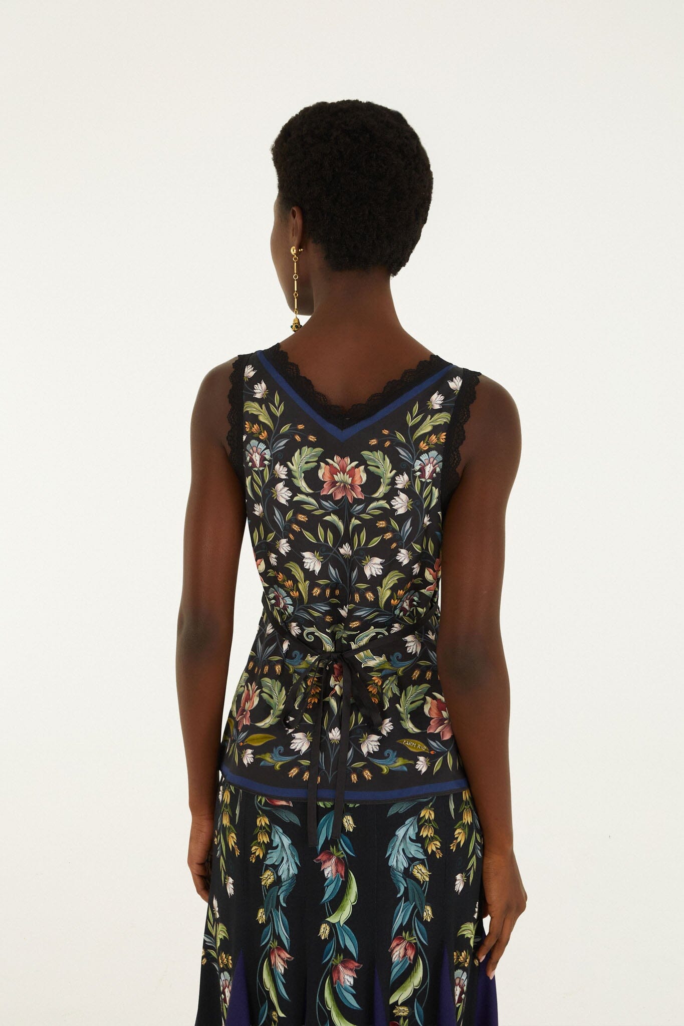 FARM Rio model wearing the Natalia Lace Sleeveless Blouse