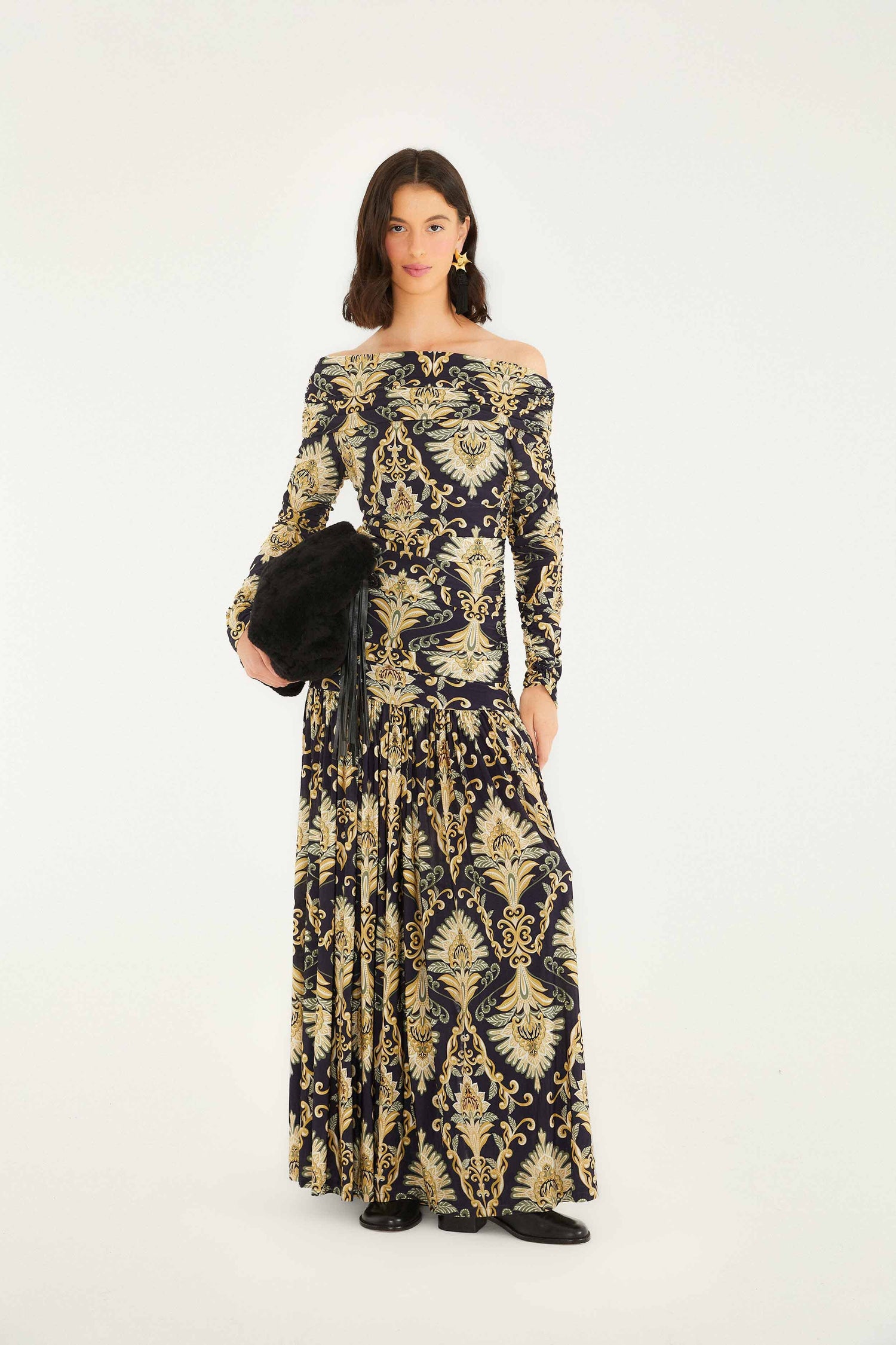 FARM Rio model wearing the Navy Blue Wonderful Arabesque Off-Shoulder Maxi Dress