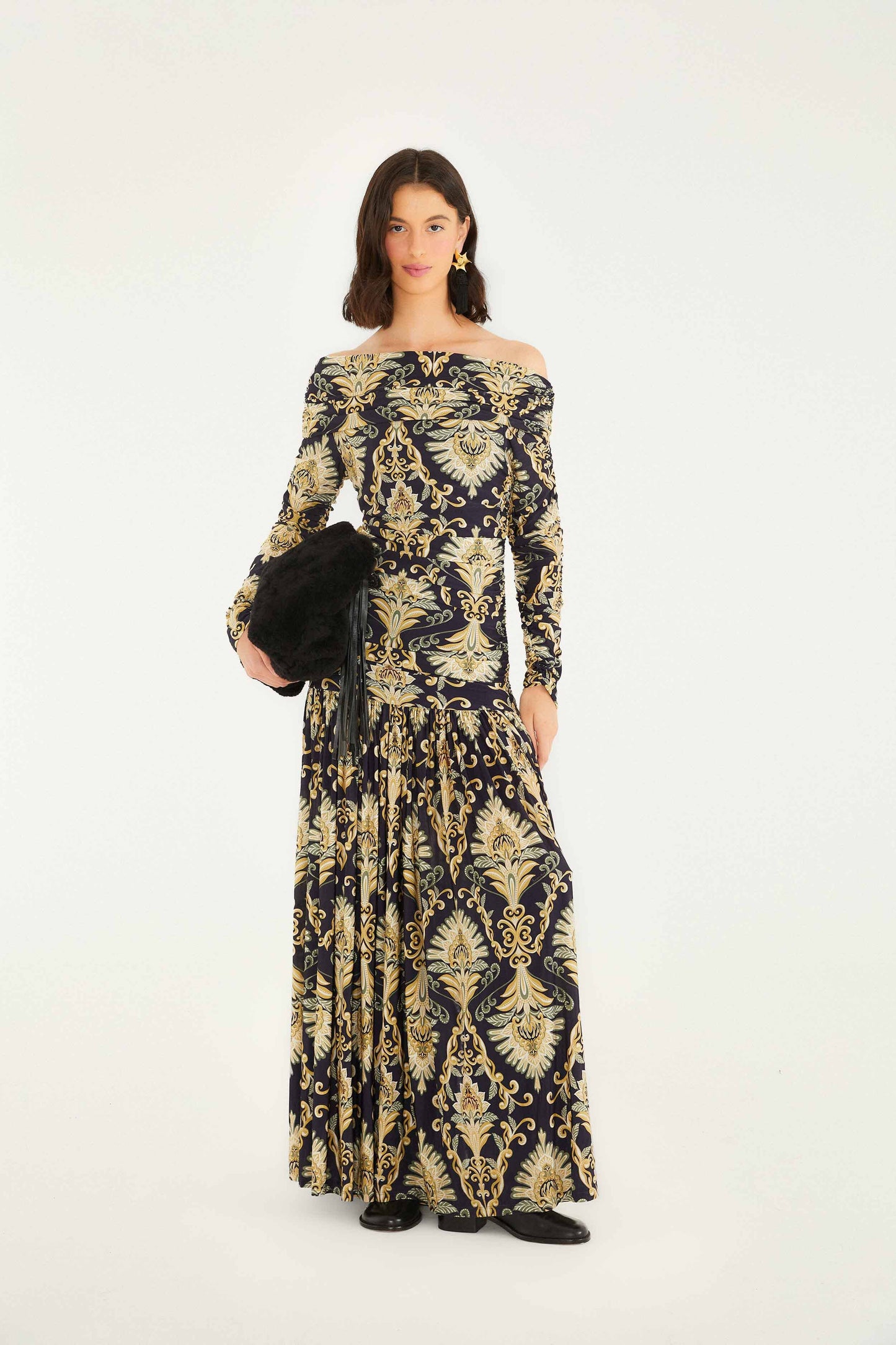 FARM Rio model wearing the Navy Blue Wonderful Arabesque Off-Shoulder Maxi Dress