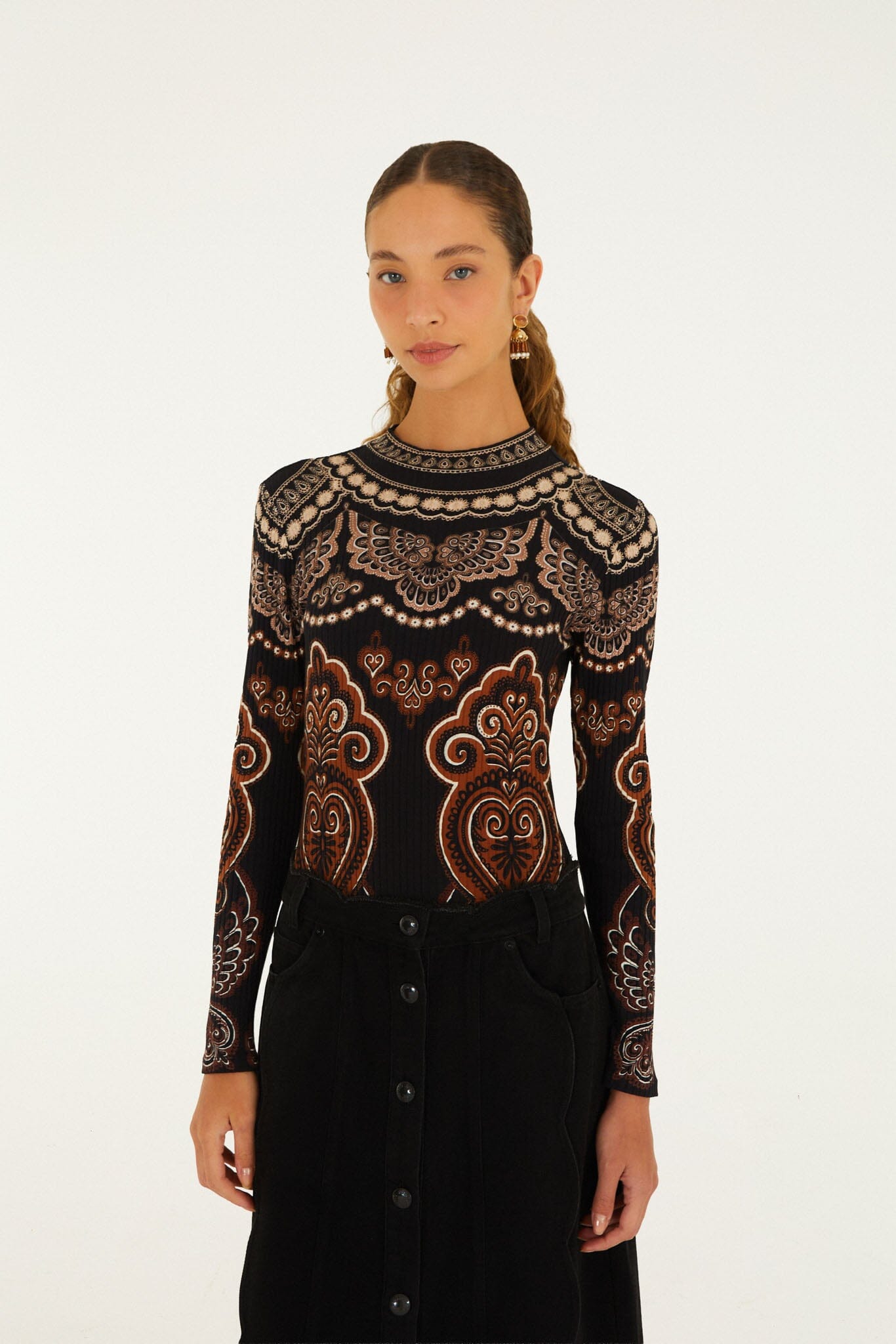 FARM Rio model wearing the Nicole Long Sleeve Jersey Bodysuit