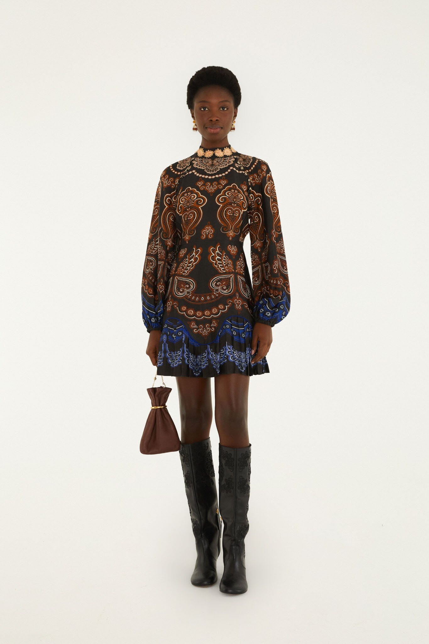 FARM Rio model wearing the Nicole Ruffled Long Sleeve Mini Dress