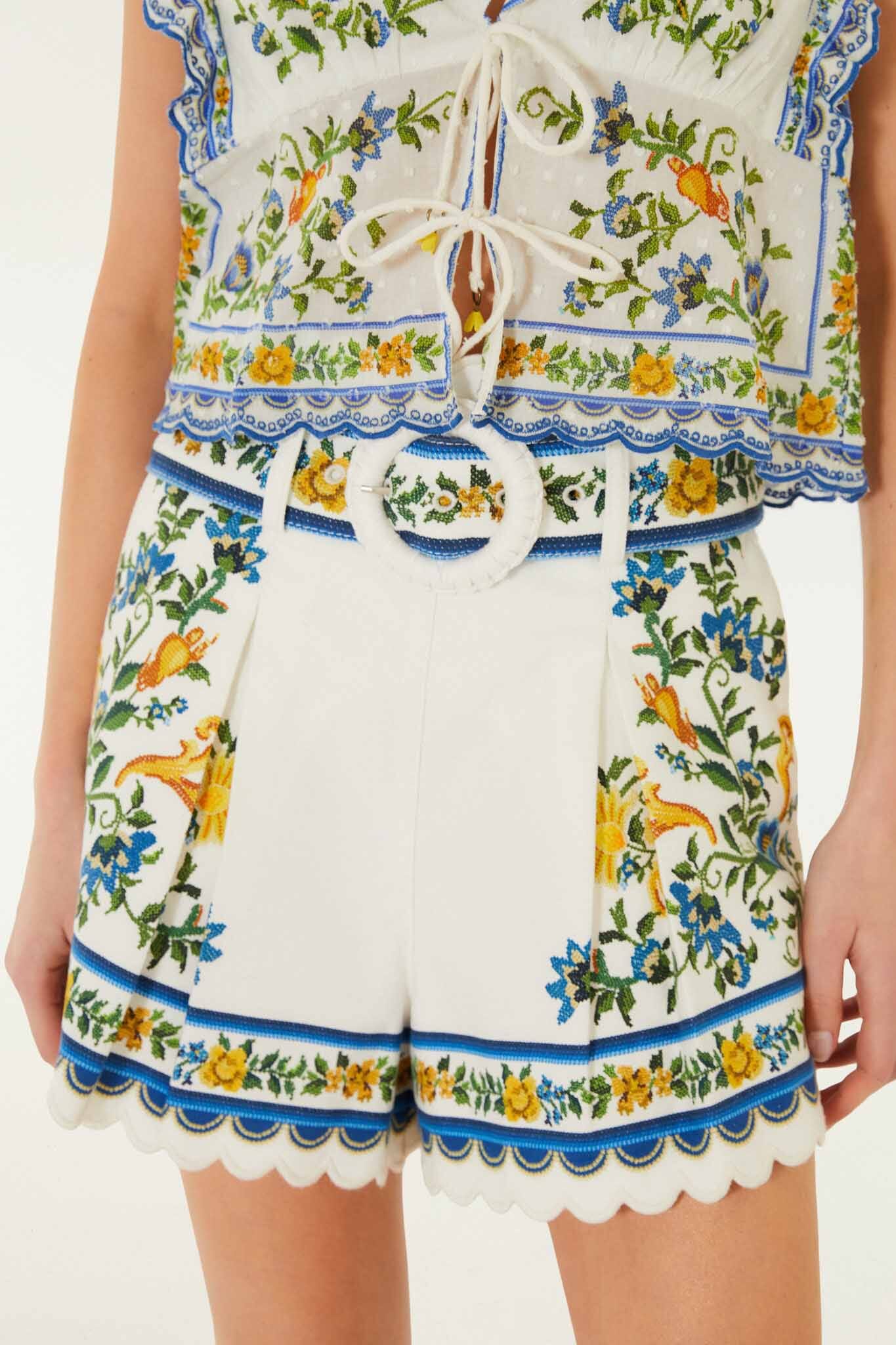 FARM Rio model wearing the Off-White Emily Floral Tapestry Belted Shorts