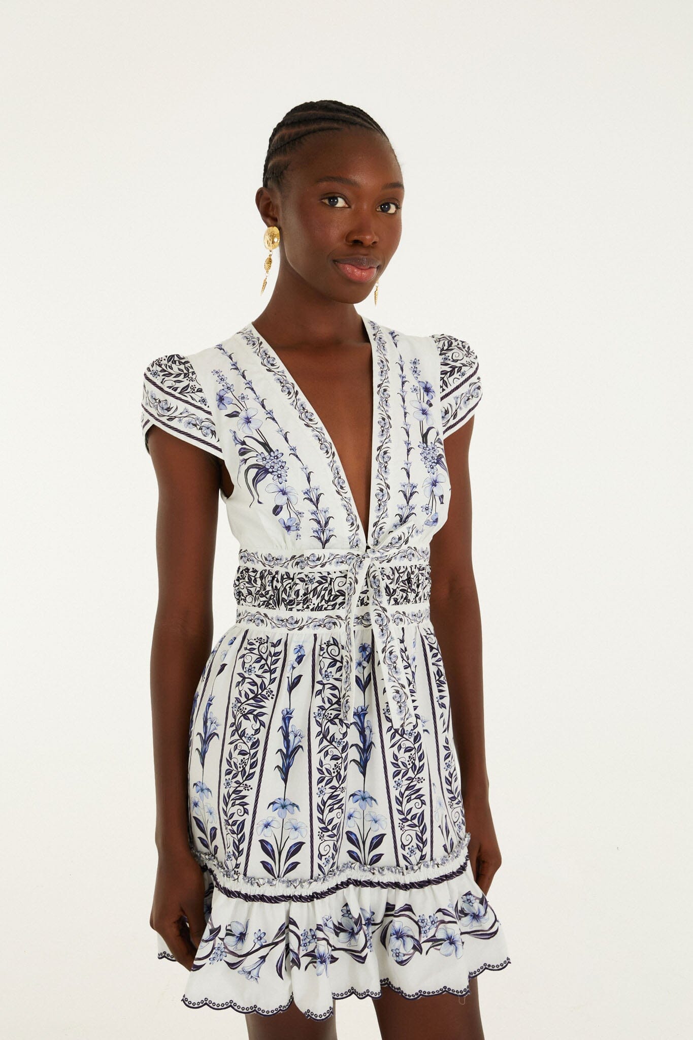 FARM Rio model wearing the Off-White Flowers Arch Ruffled Mini Dress