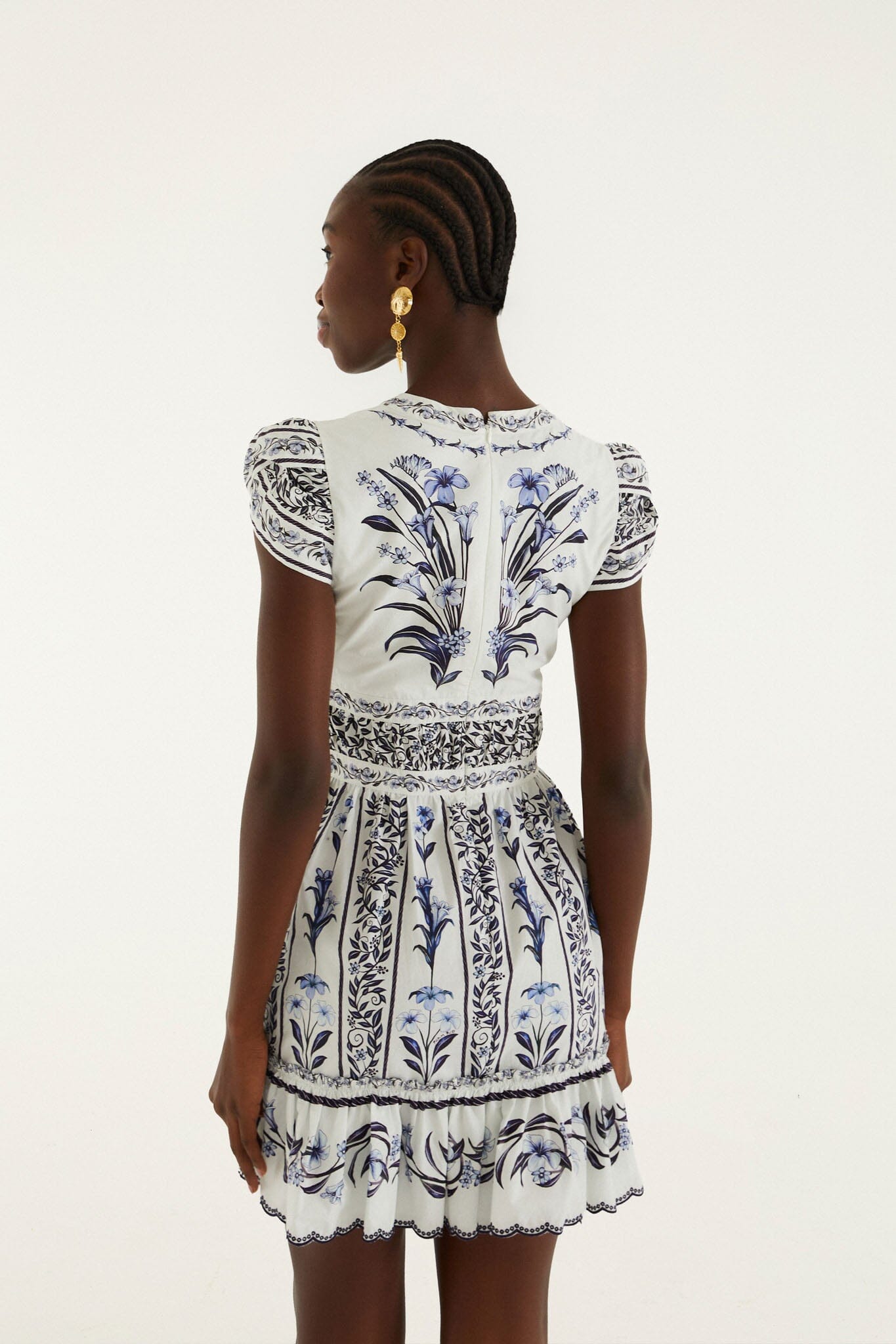 FARM Rio model wearing the Off-White Flowers Arch Ruffled Mini Dress