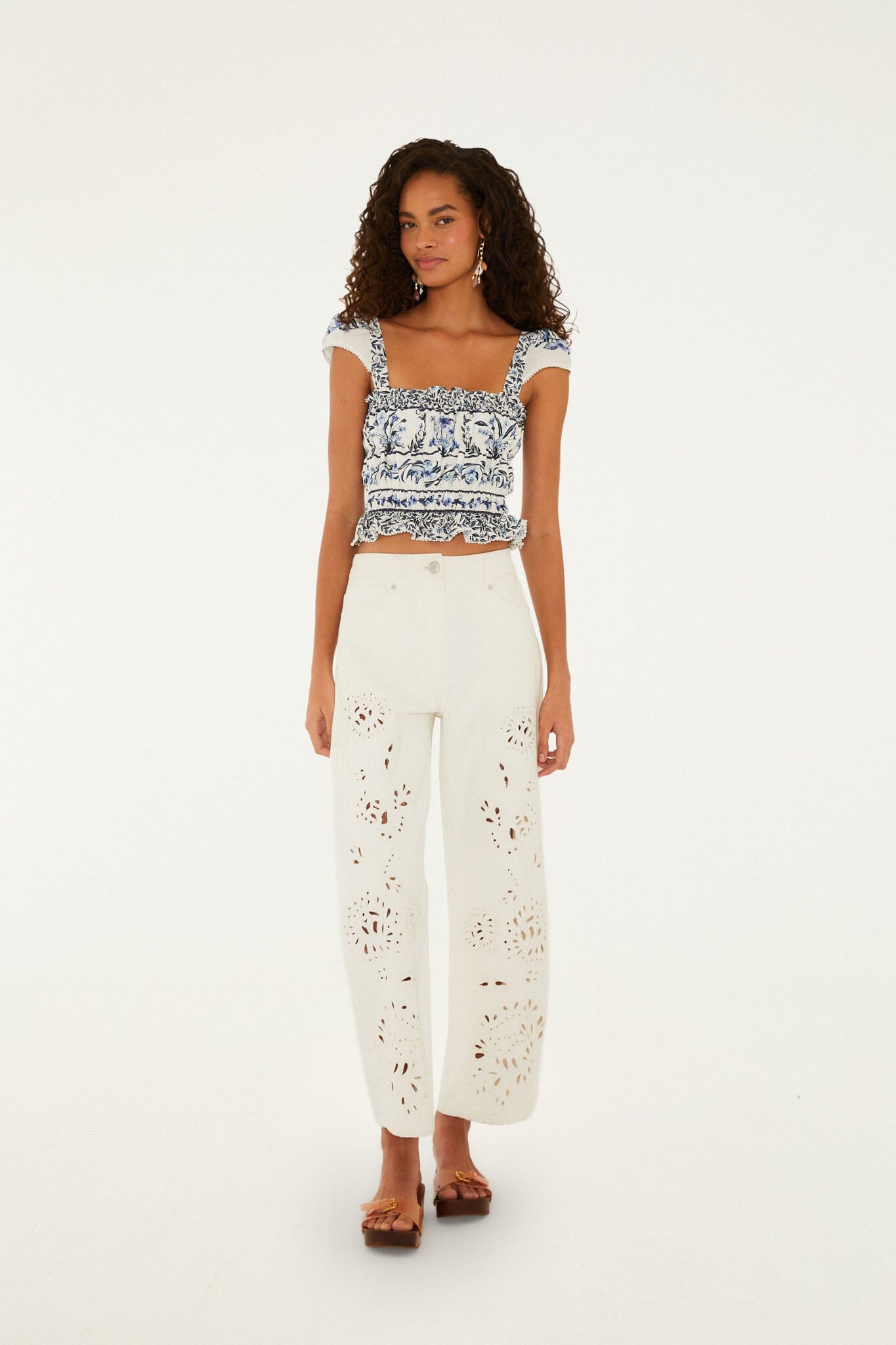 FARM Rio model wearing the Off-White Flowers Arch Smocked Organic Cotton Blouse
