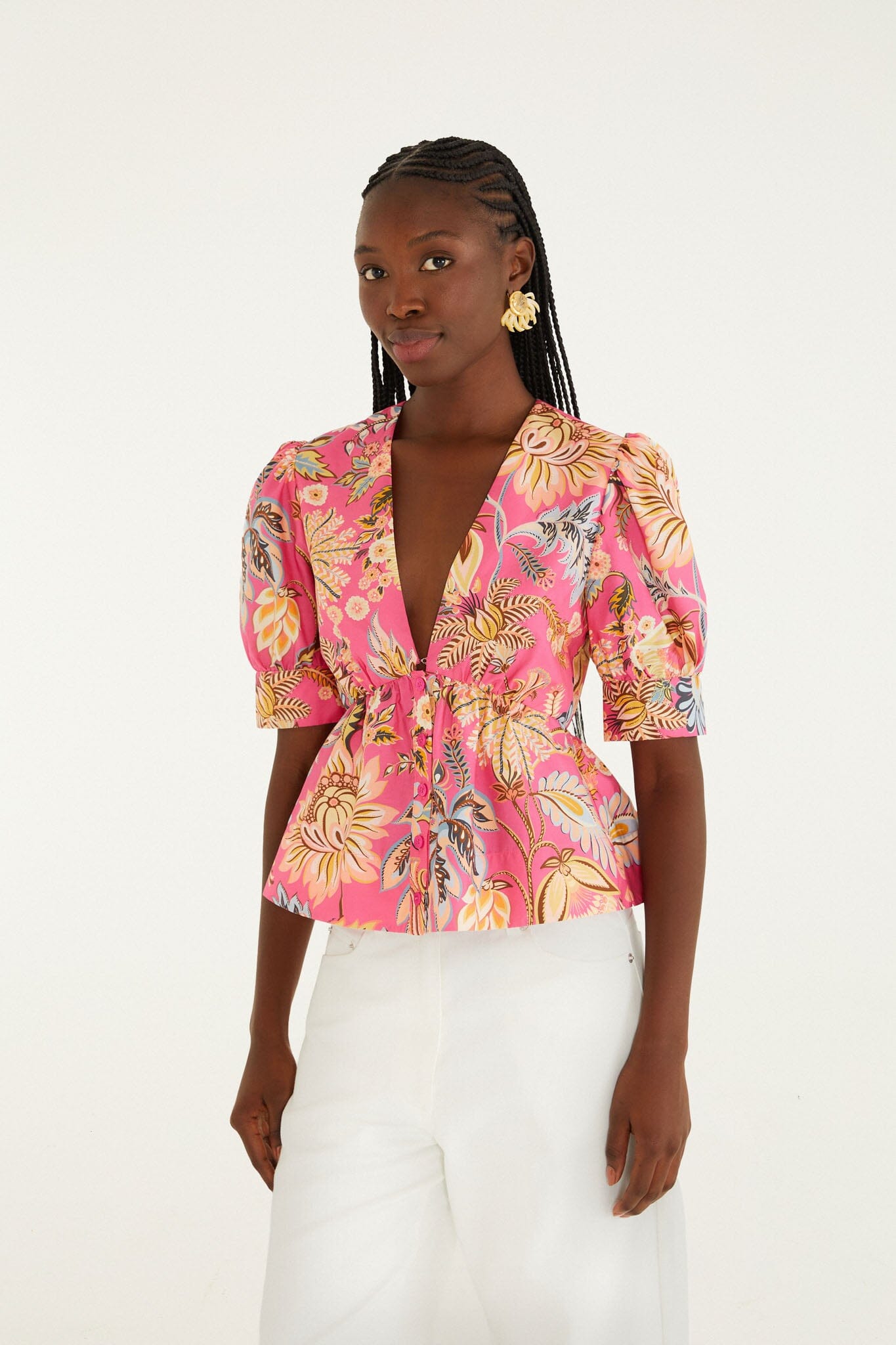 FARM Rio model wearing the Pink Ligia Floral Puff Sleeve Organic Cotton Blouse