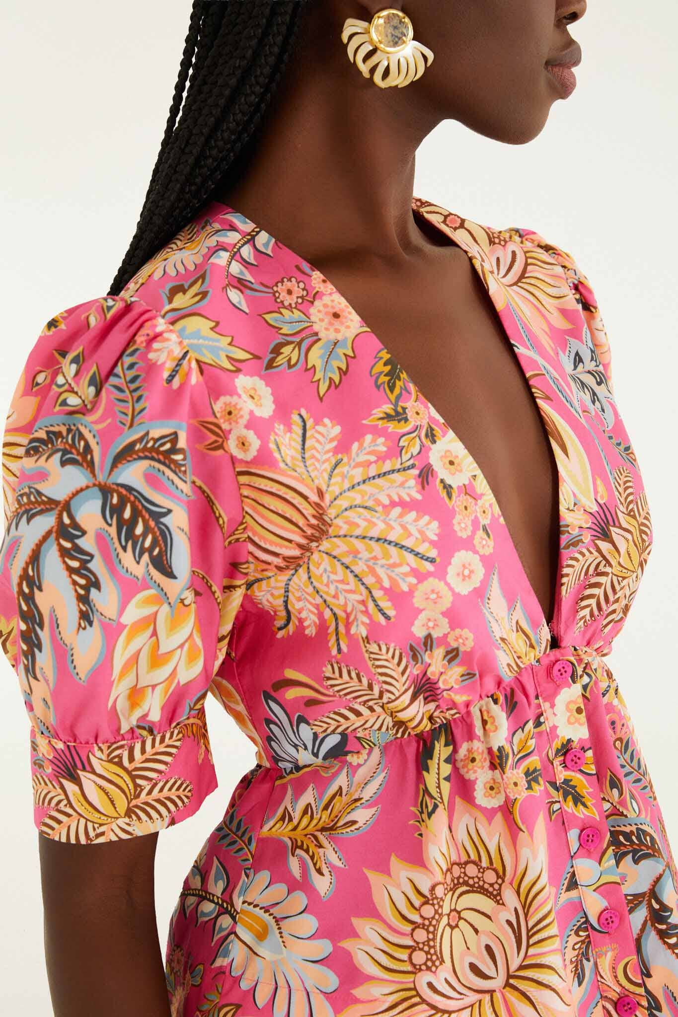 FARM Rio model wearing the Pink Ligia Floral Puff Sleeve Organic Cotton Blouse