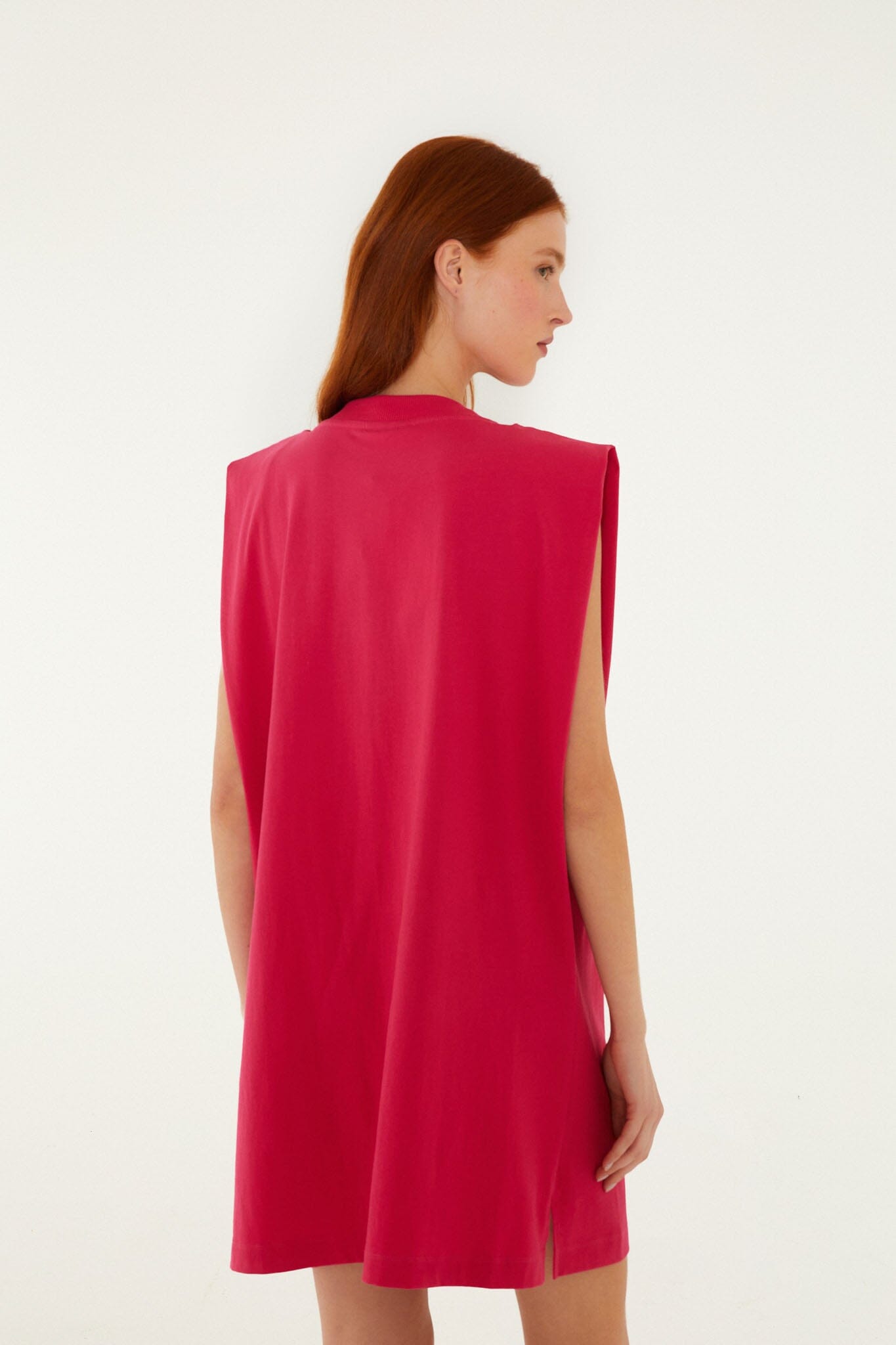 FARM Rio model wearing the Pink Tropical Rose Padded Shoulders Organic Cotton Mini Dress