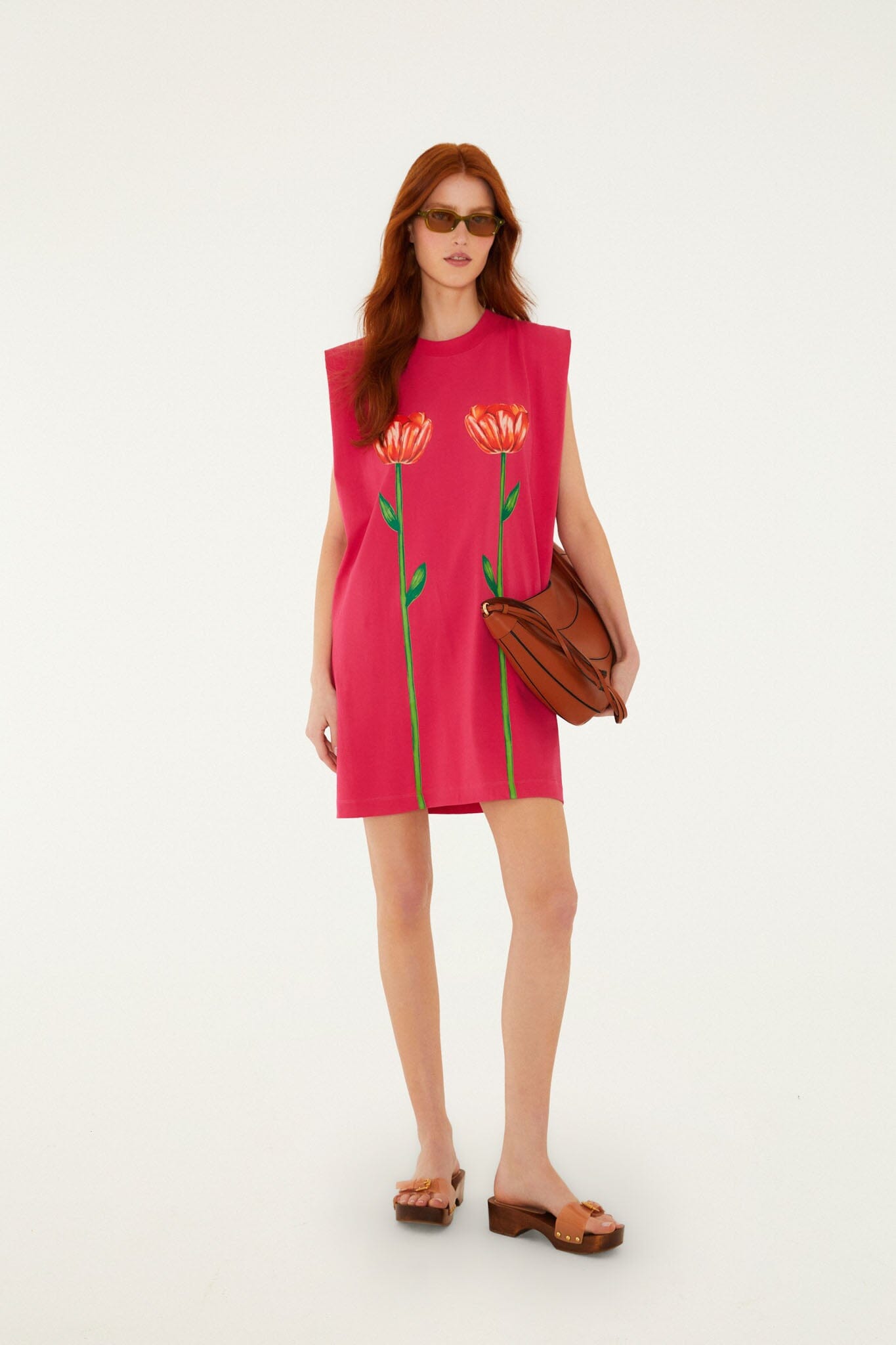FARM Rio model wearing the Pink Tropical Rose Padded Shoulders Organic Cotton Mini Dress