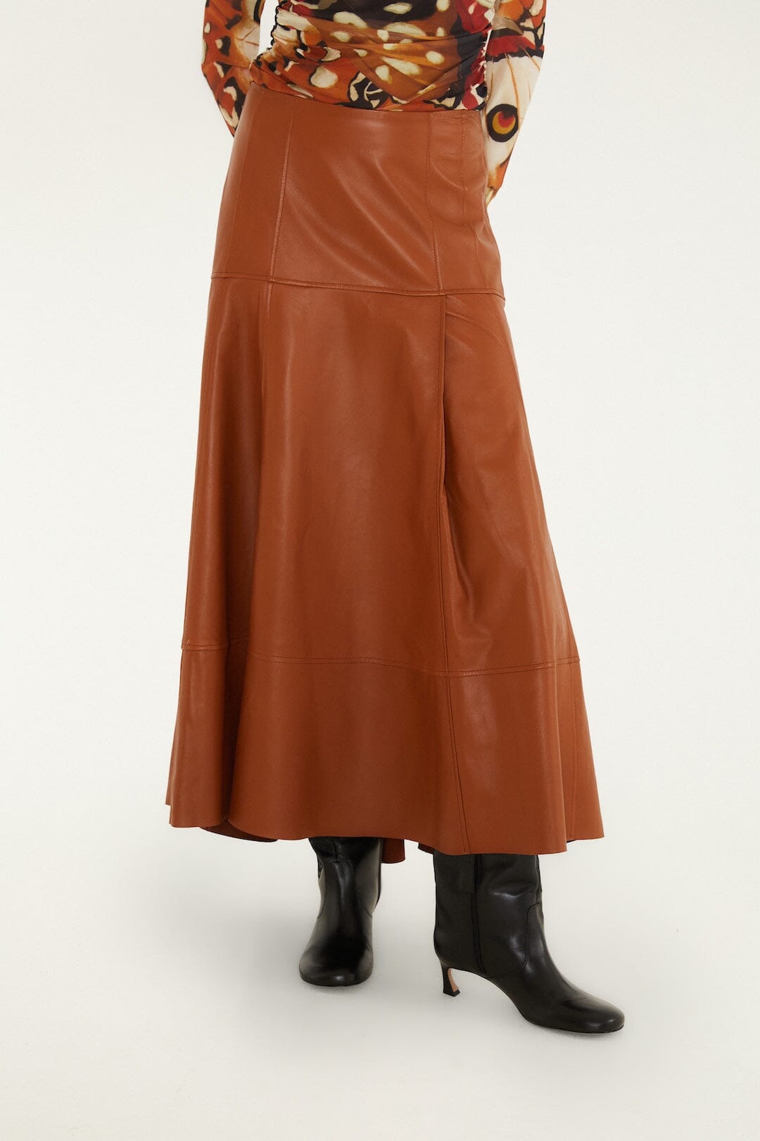 FARM Rio model wearing the Pleats Leather Midi Skirt