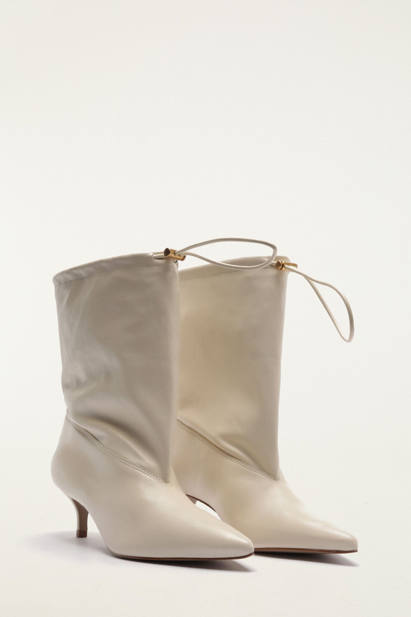FARM Rio model wearing the Pouch Kitten Bootie