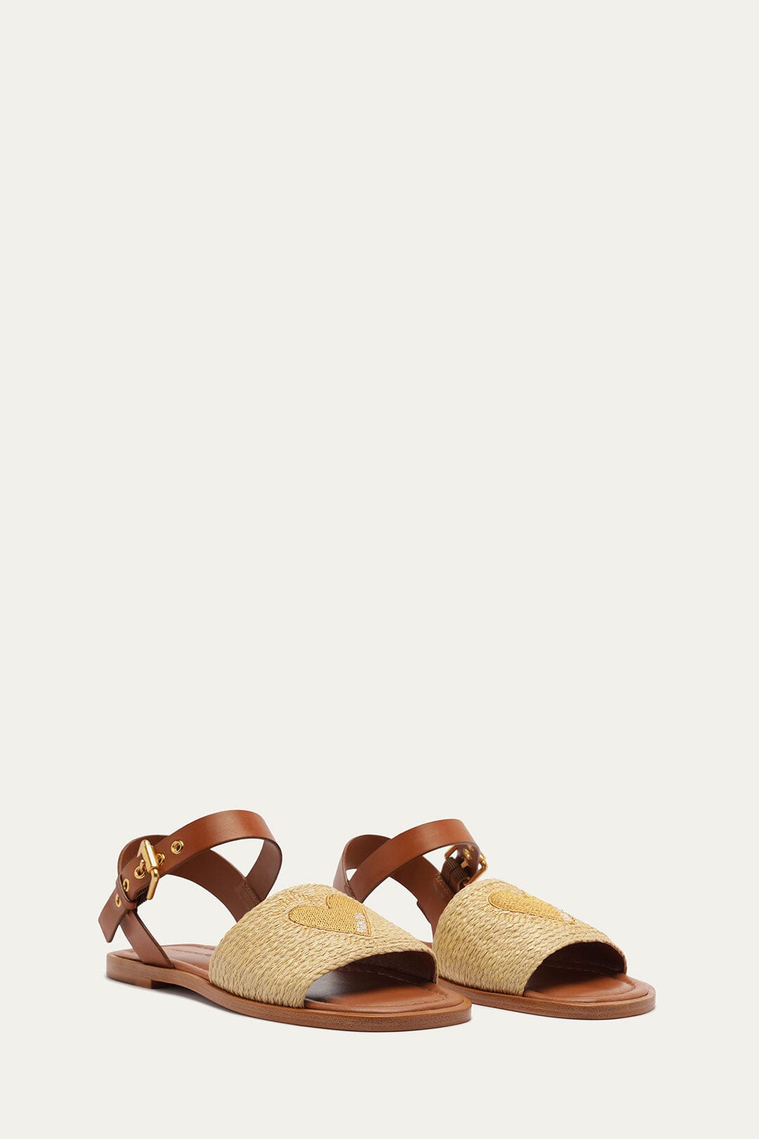 FARM Rio model wearing the Raffia Flat Sandal