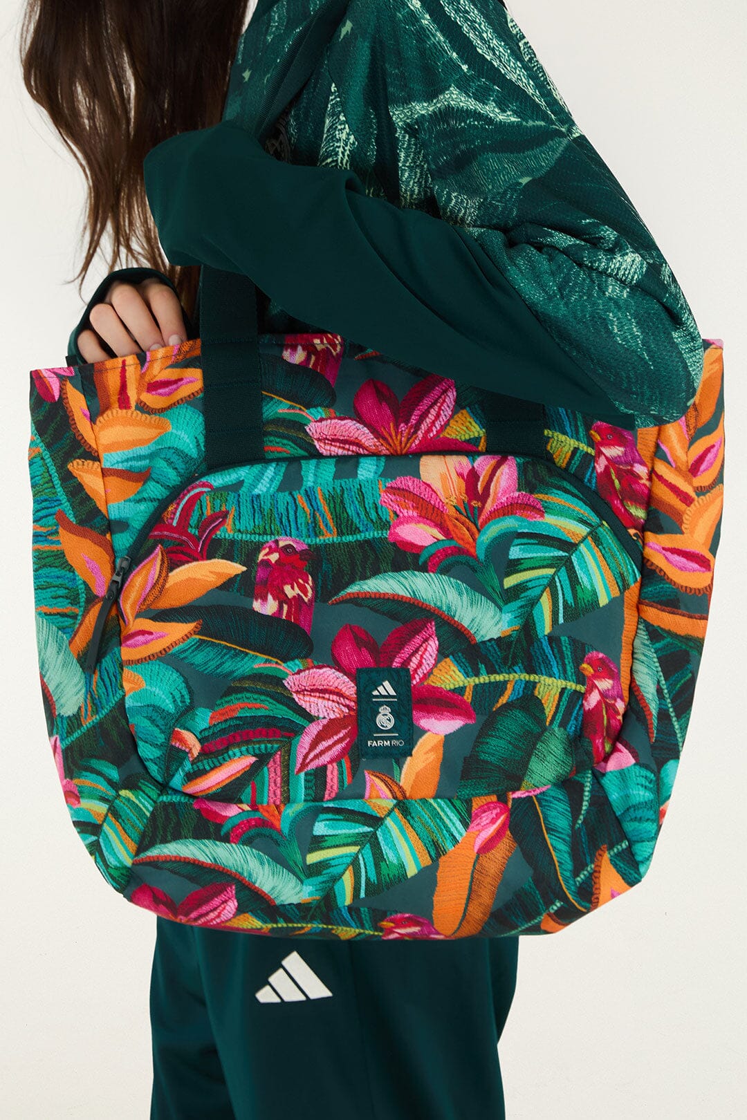 FARM Rio model wearing the Real Foliage Green Adidas Tote Bag