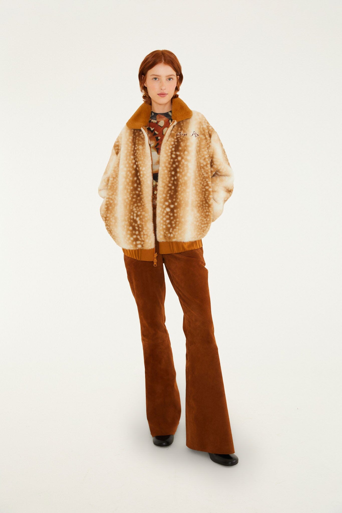 FARM Rio model wearing the Riveted Flare Leather Trousers