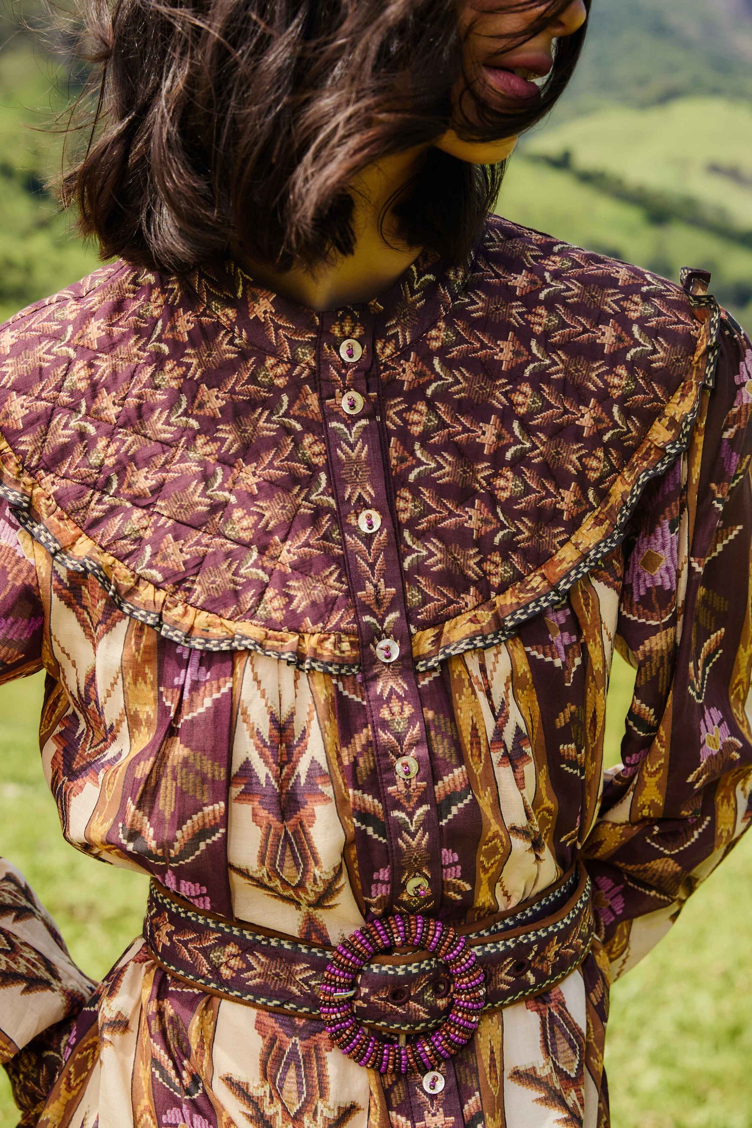 FARM Rio model wearing the Sand Embroidered Tapestry Long Sleeve Mini Dress