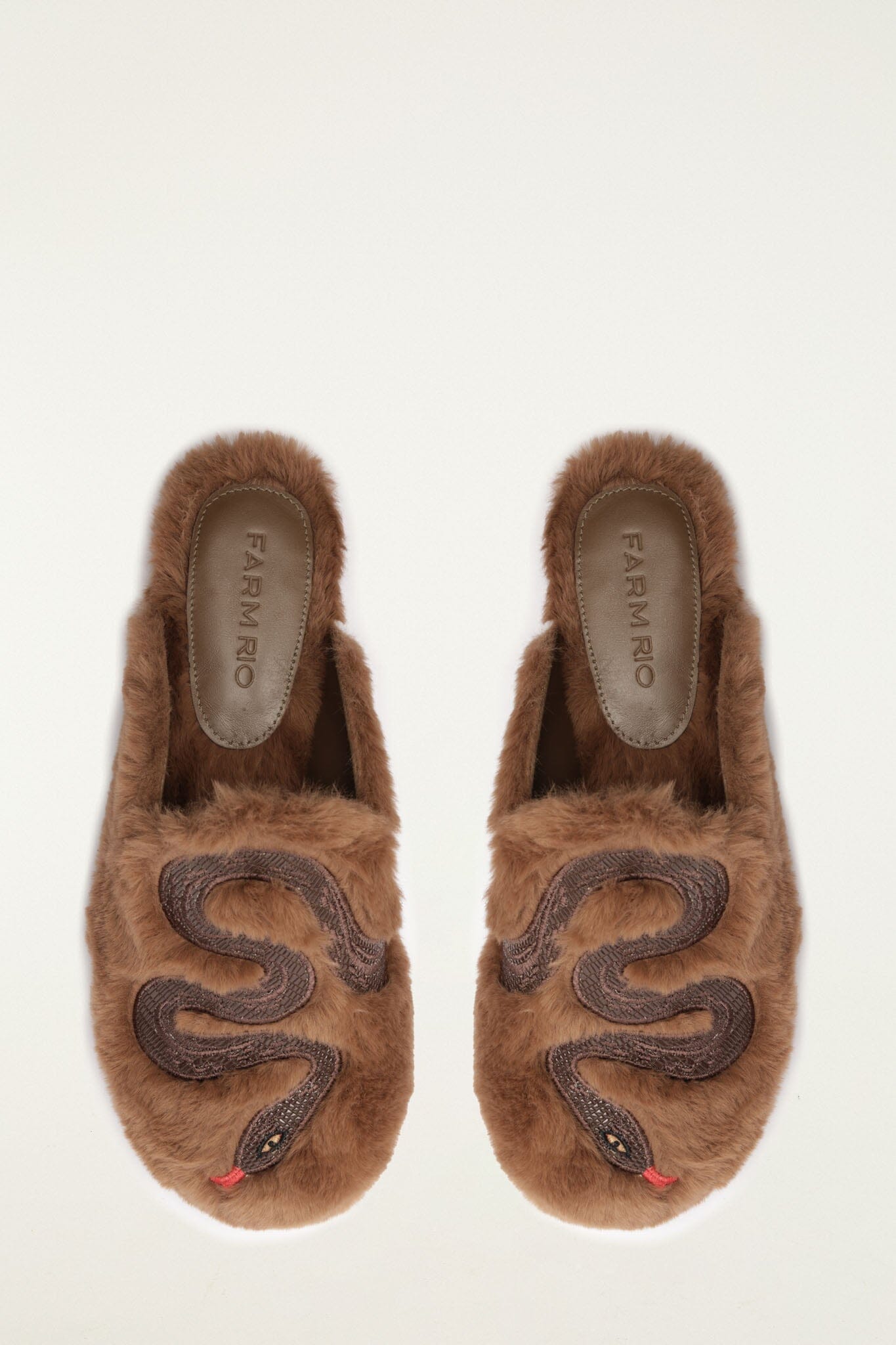 FARM Rio model wearing the Shearling Snake Mule