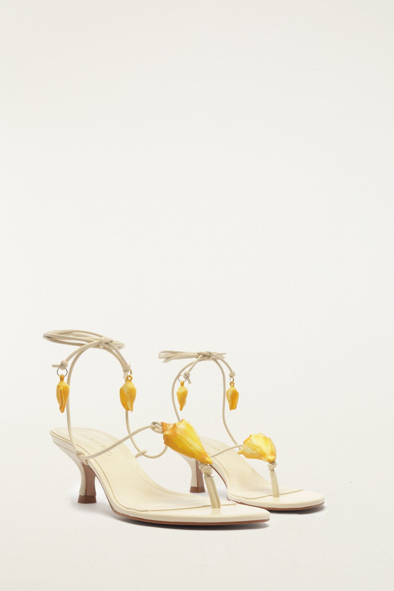FARM Rio model wearing the Shell Kitten Heel