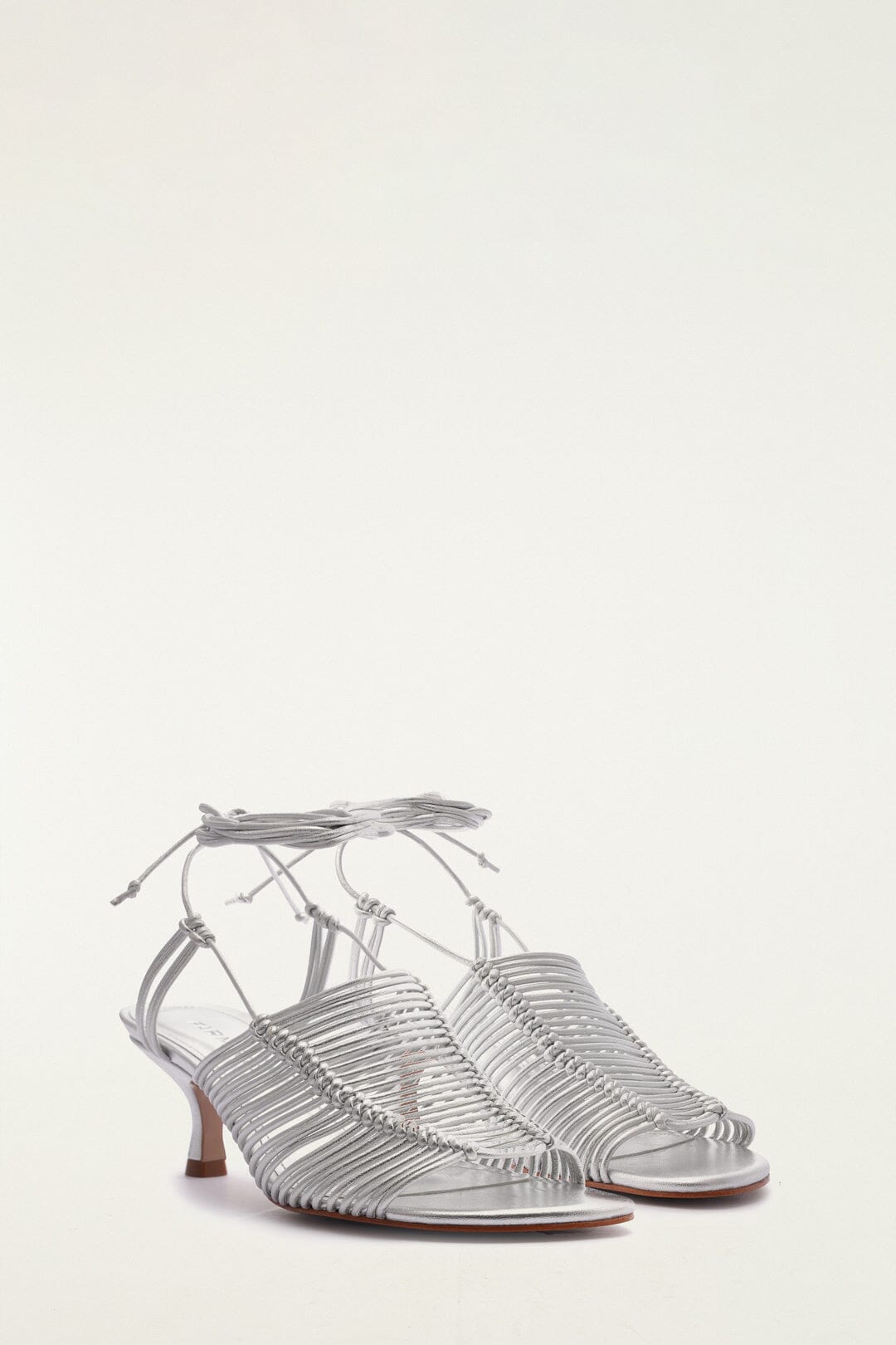 FARM Rio model wearing the Silver Macrame Heeled Sandal