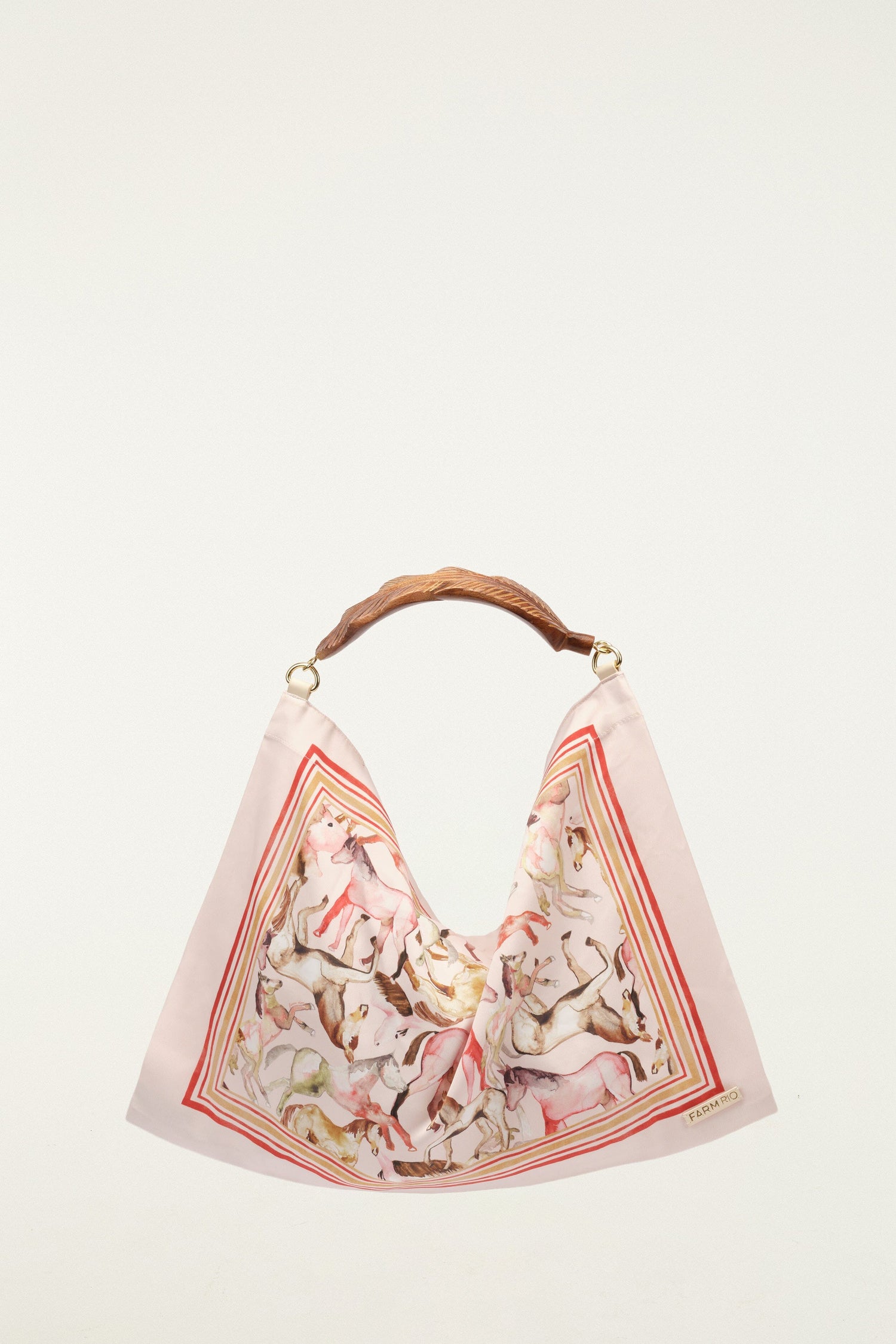 FARM Rio model wearing the Soft Pink Horses Satin Small Scarf Bag