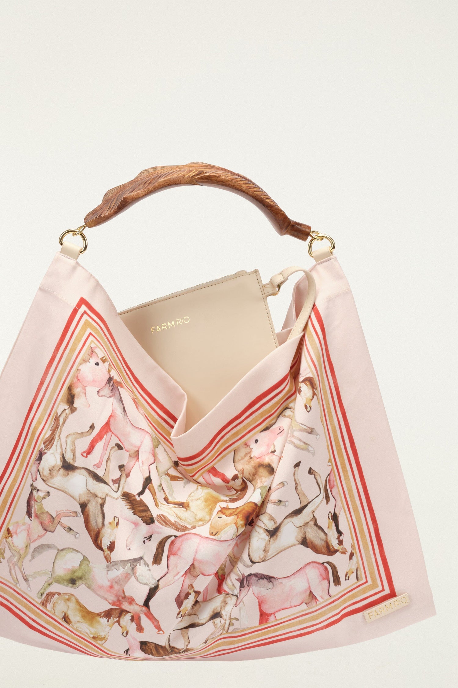 FARM Rio model wearing the Soft Pink Horses Satin Small Scarf Bag