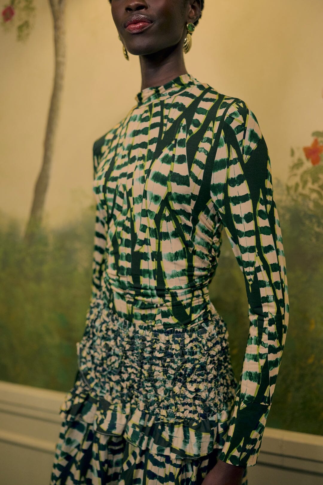 FARM Rio model wearing the Striped Leaves Long Sleeve Blouse