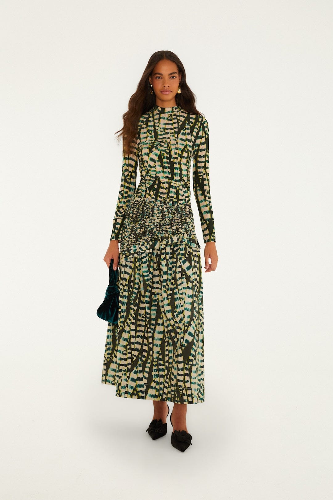FARM Rio model wearing the Striped Leaves Smocked Maxi Skirt