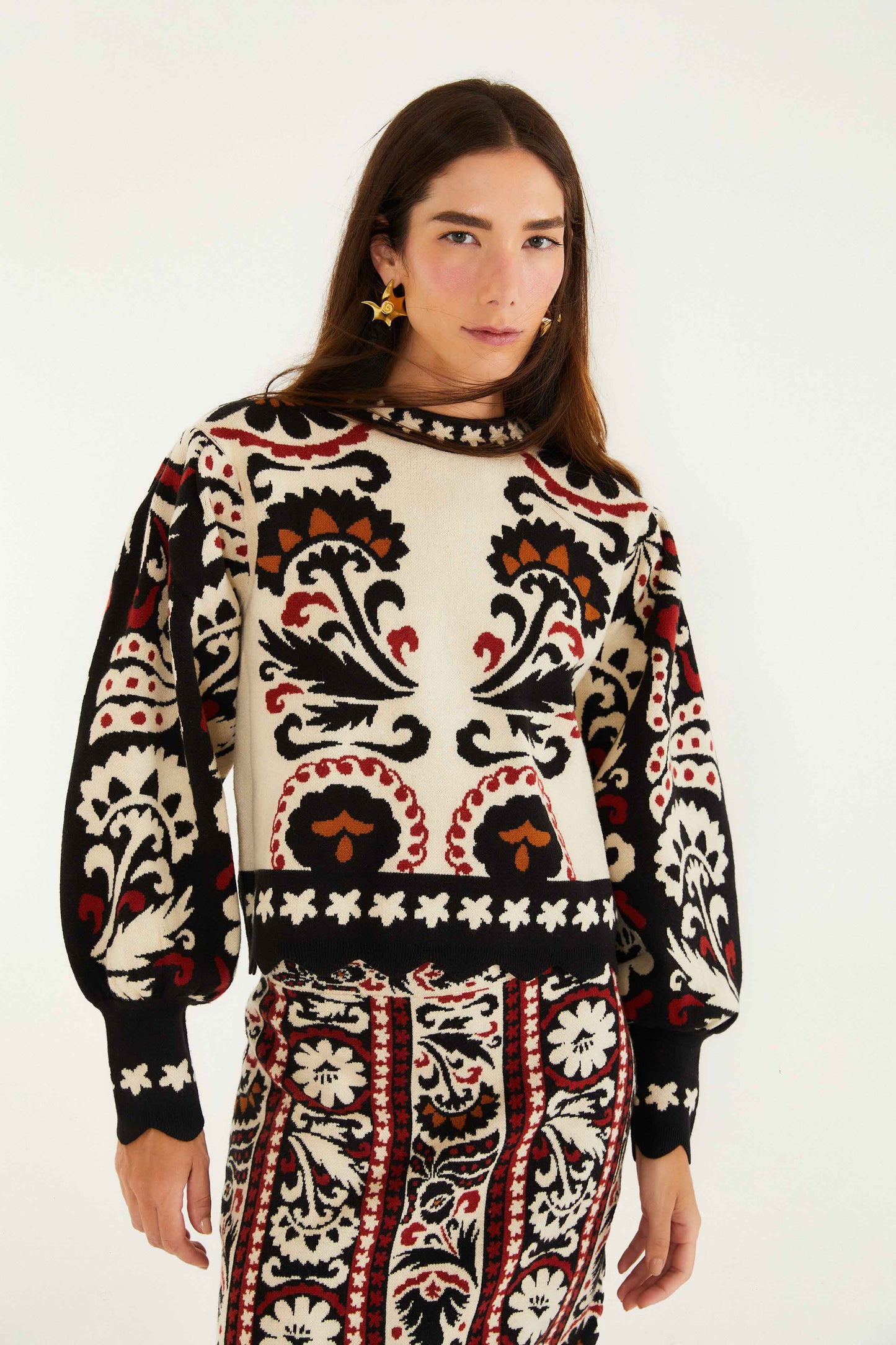 FARM Rio model wearing the Stripes Winter Tapestry Knit Sweater