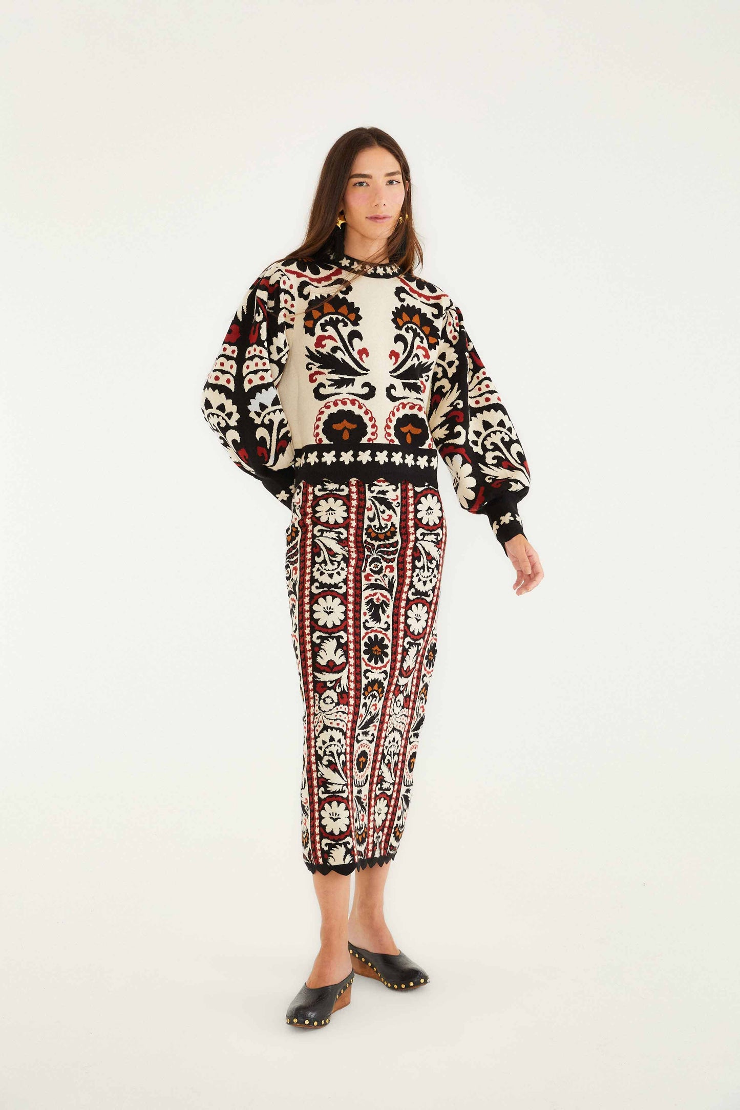 FARM Rio model wearing the Stripes Winter Tapestry Knit Sweater