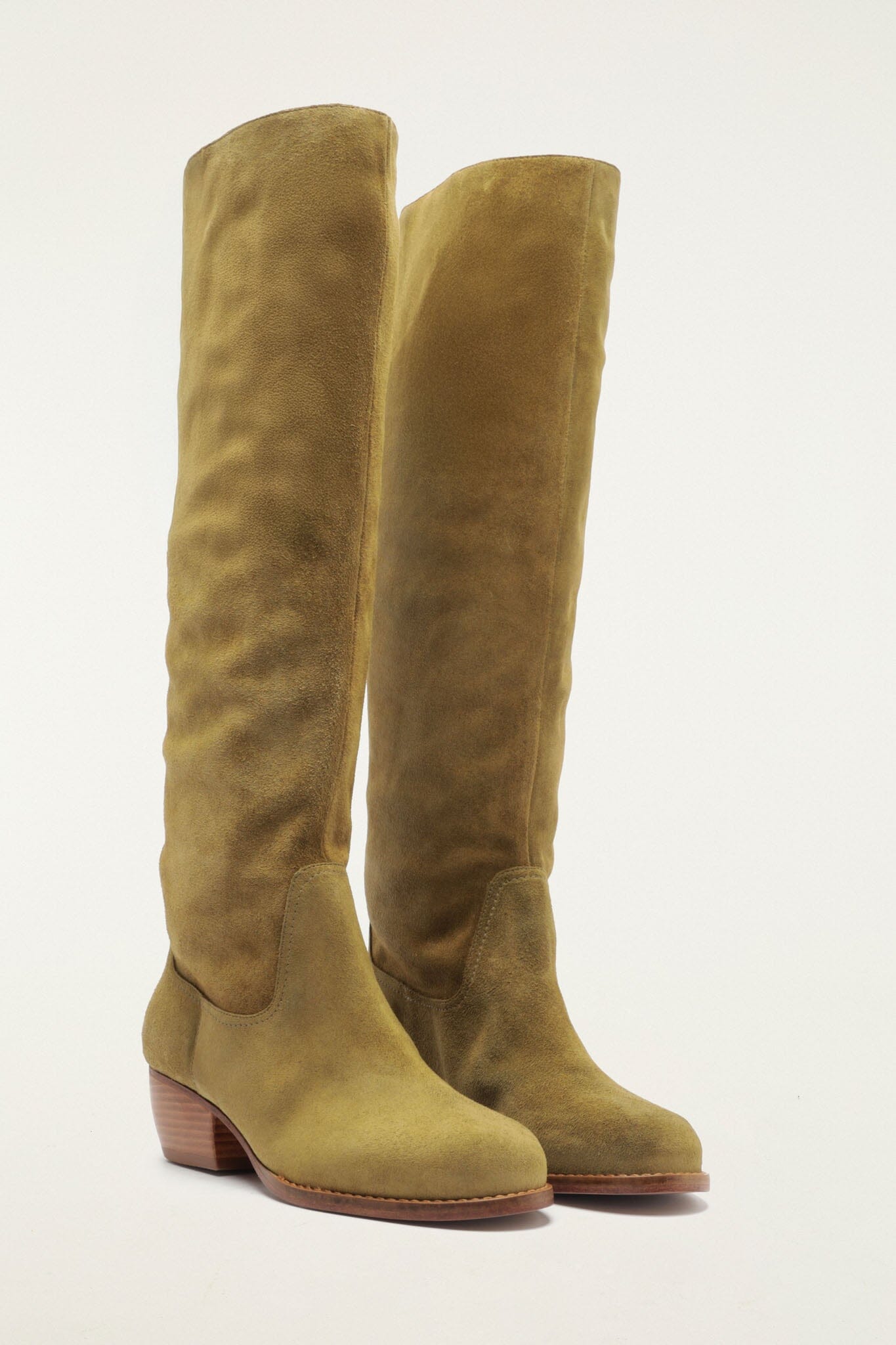 FARM Rio model wearing the Suede Riding Boot